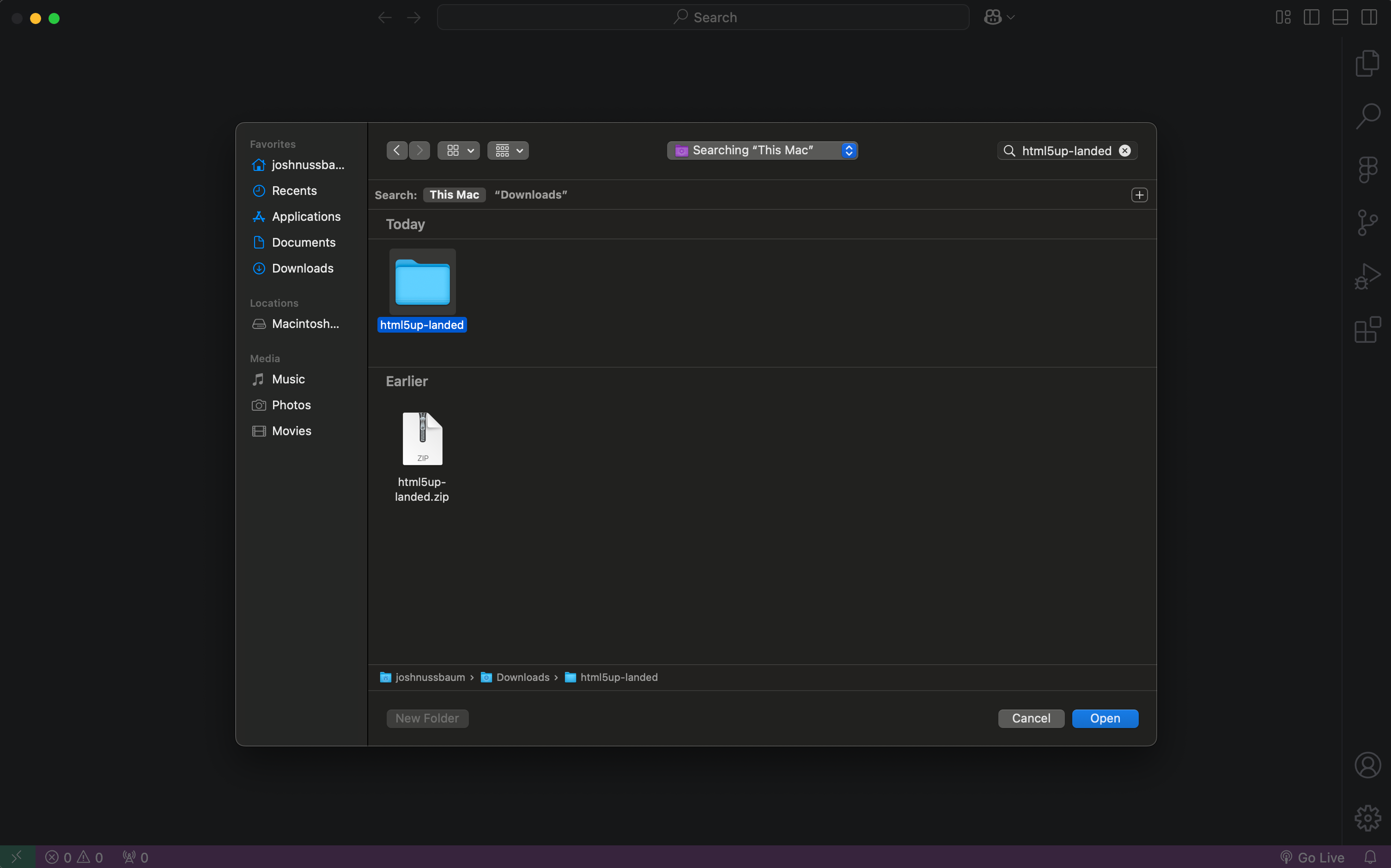 Opening a folder called html5up-landed in VS Code