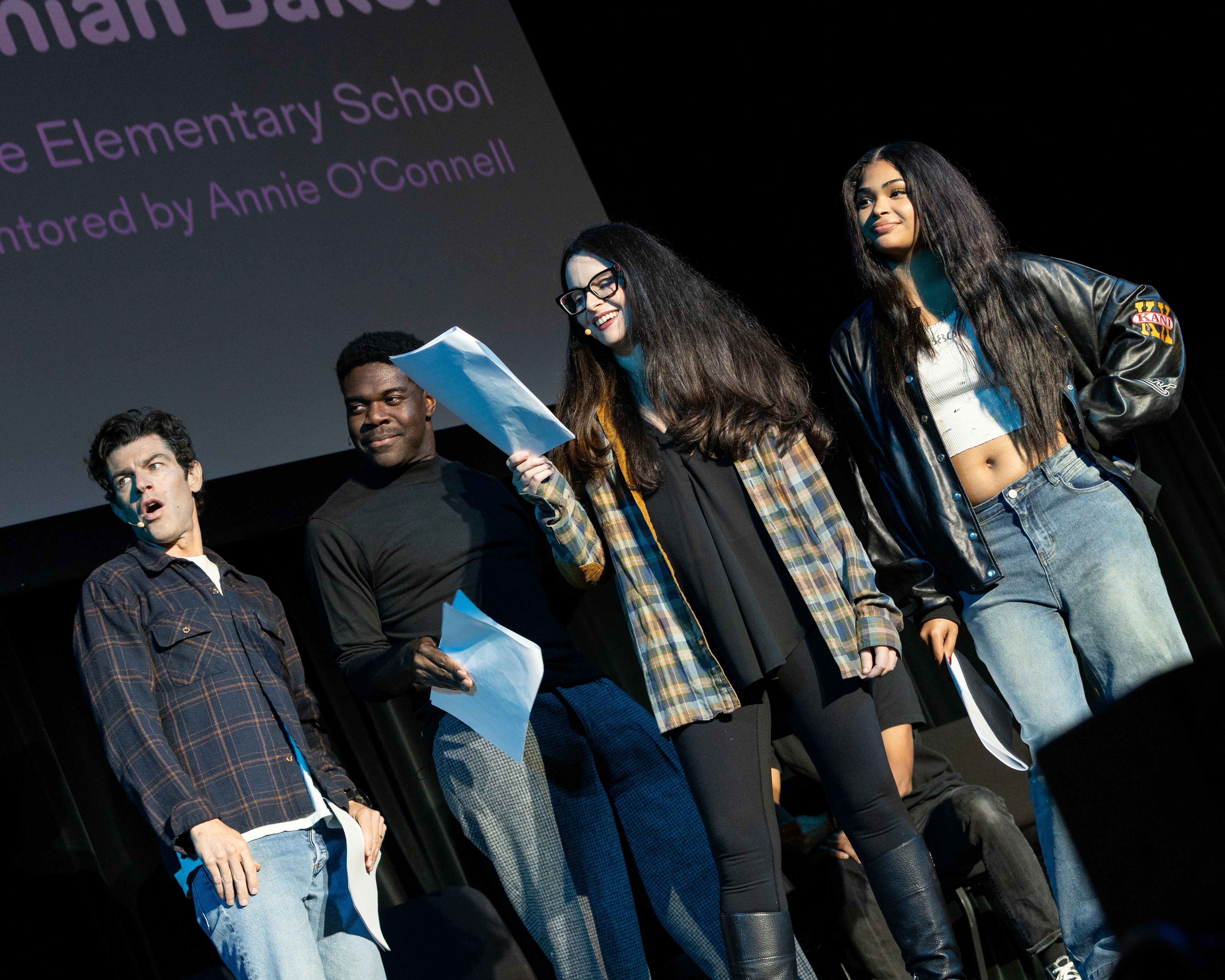 A group of actors performing on stage