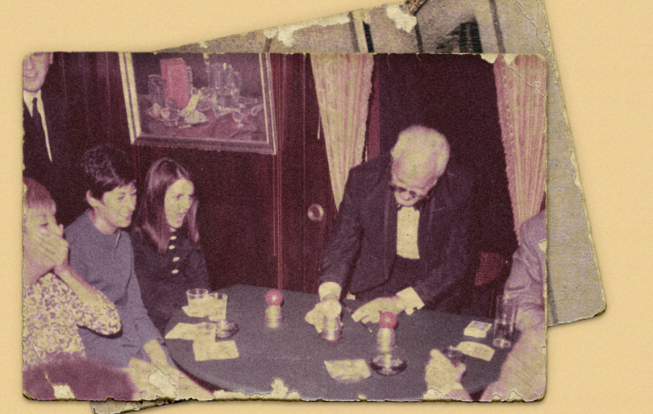 A vintage photo of a magician doing tricks