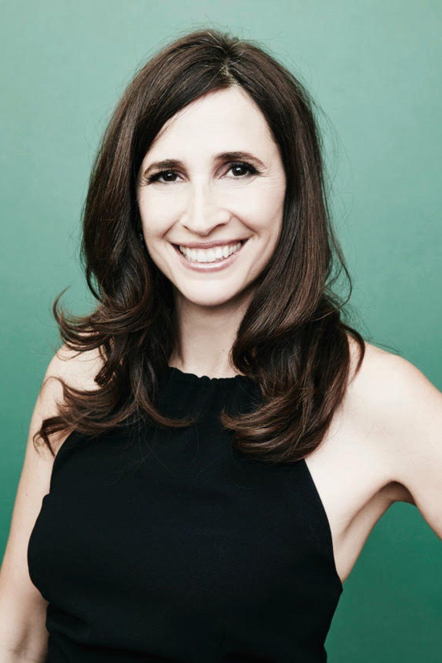 Headshot of Michaela Watkins