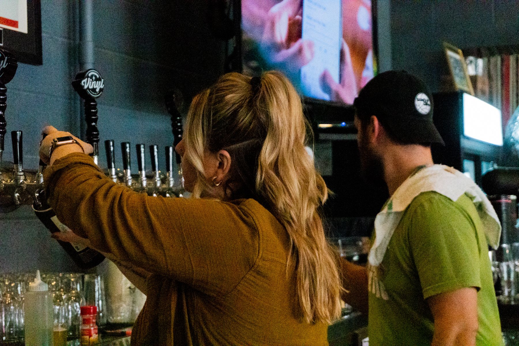 Kylene and Nick serving customers during Vinyl Brewing's VinylMania event in 2021