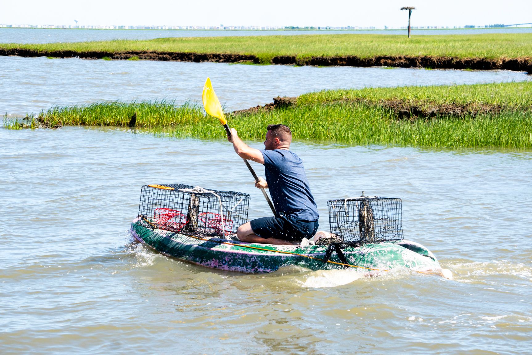 Paul paddling out on the hunt for blue claw crabs