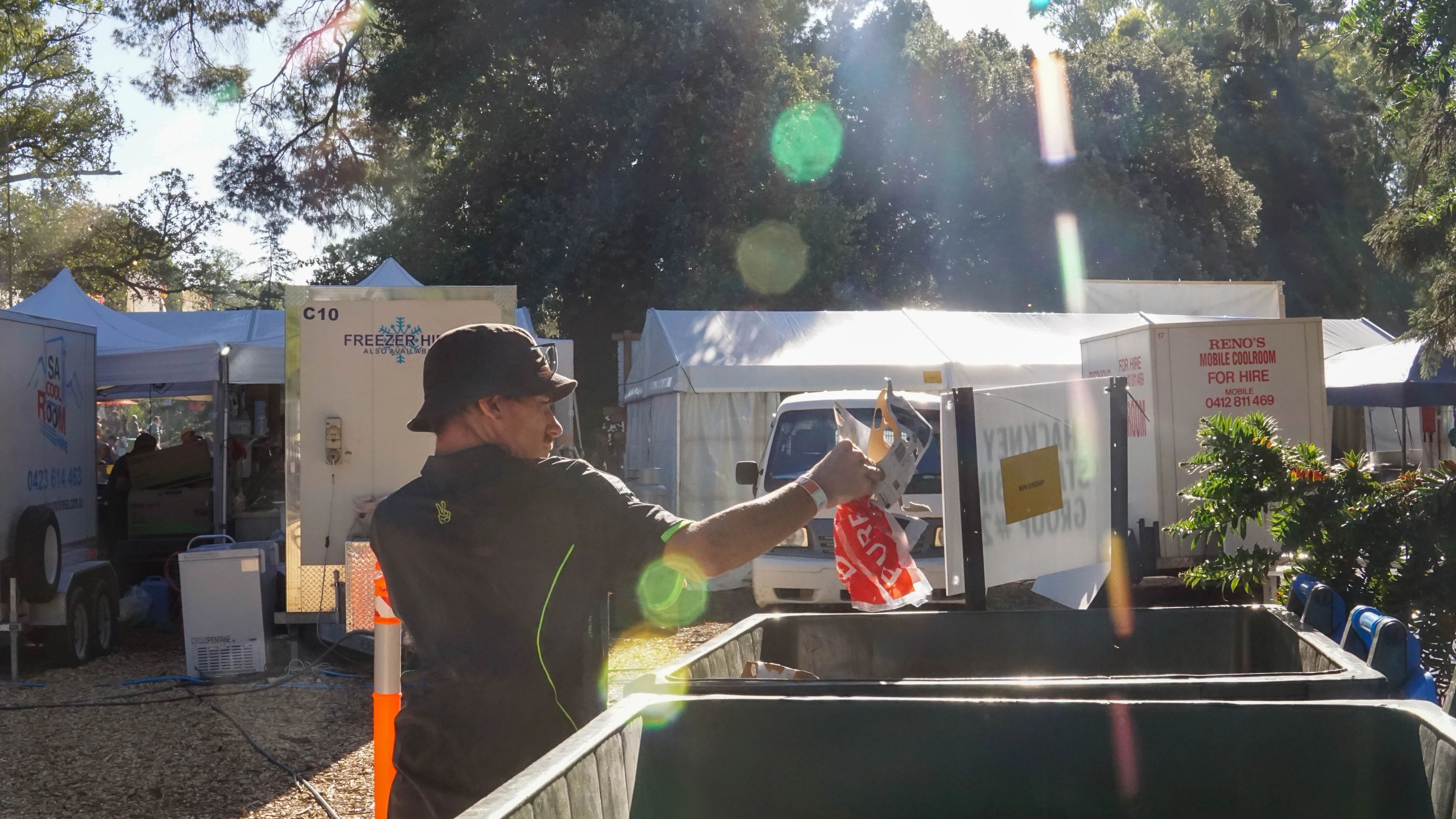Team member checking bin contents