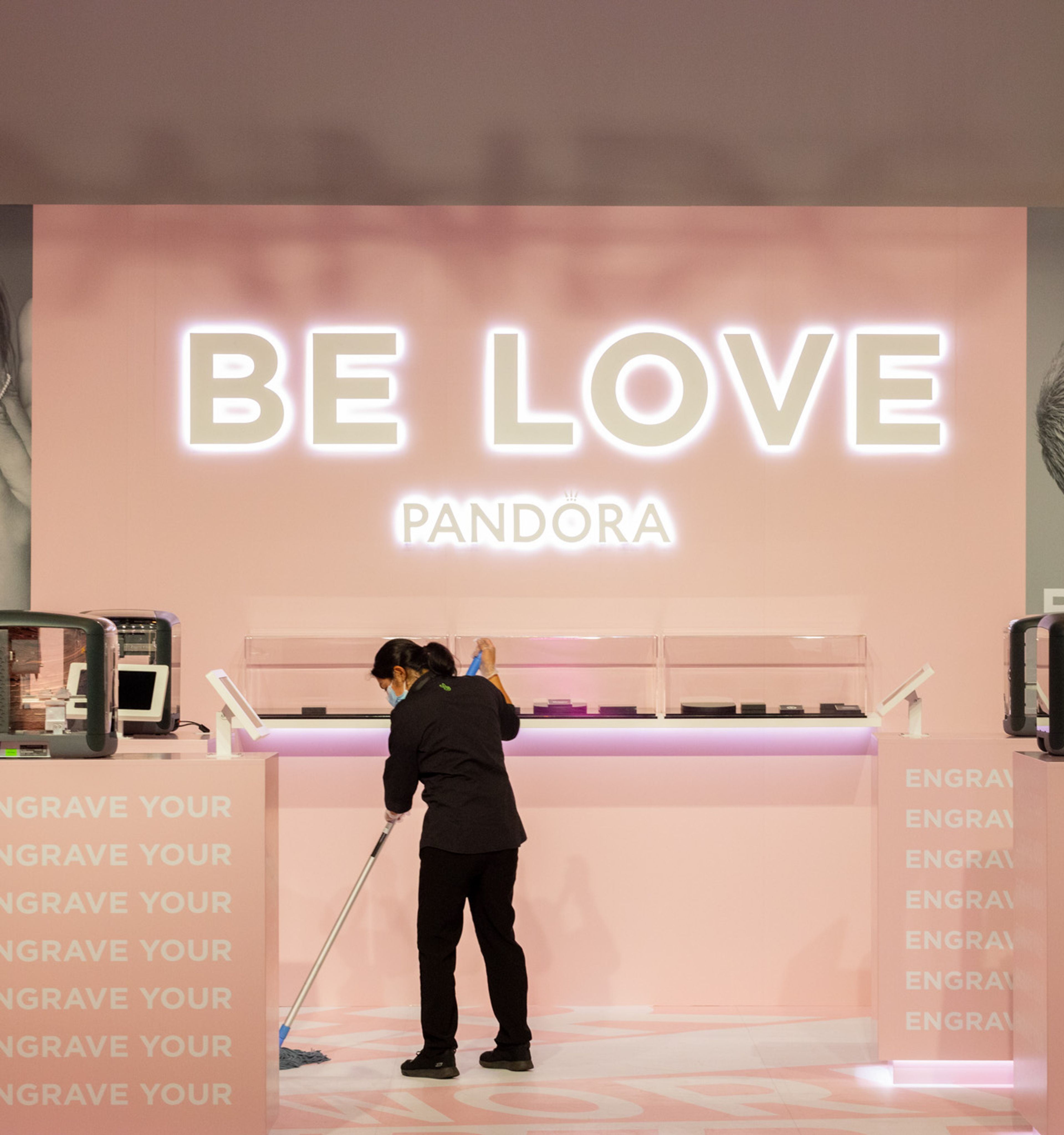 Clean Vibes professional staff moping Pandora stand at Sydney Fashion week 2024