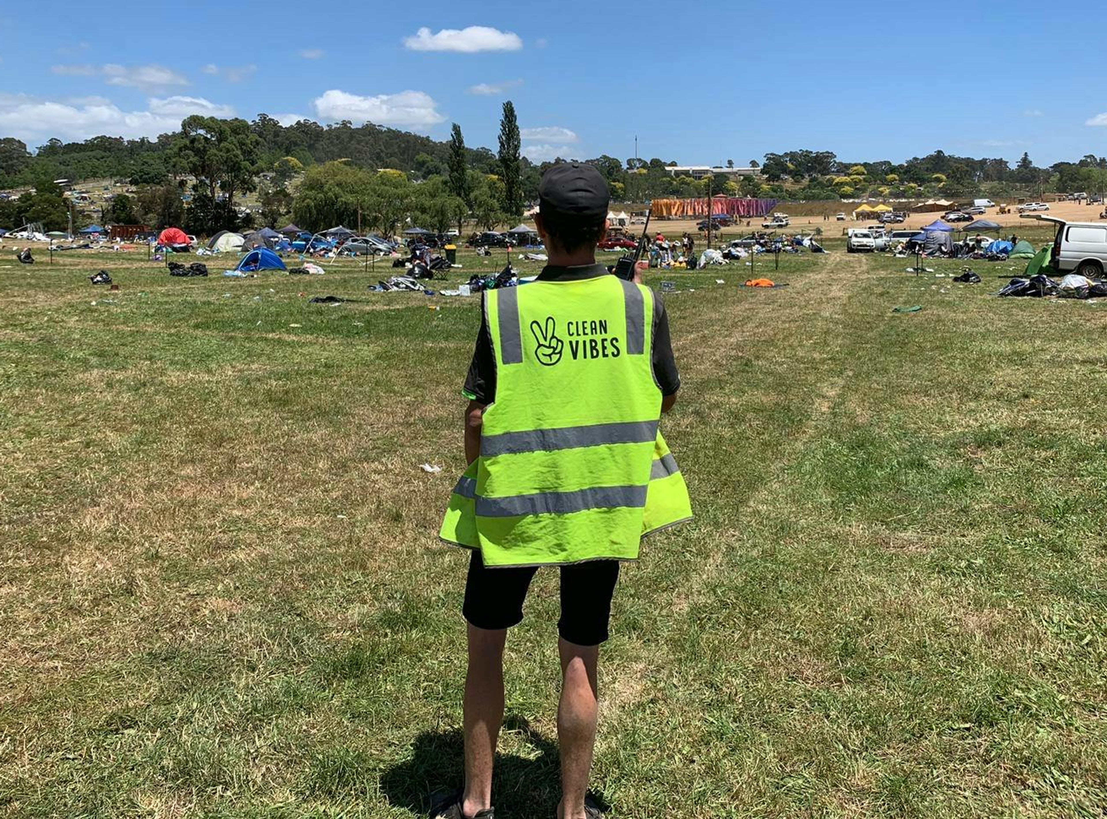 Clean Vibes employee looking at the campground