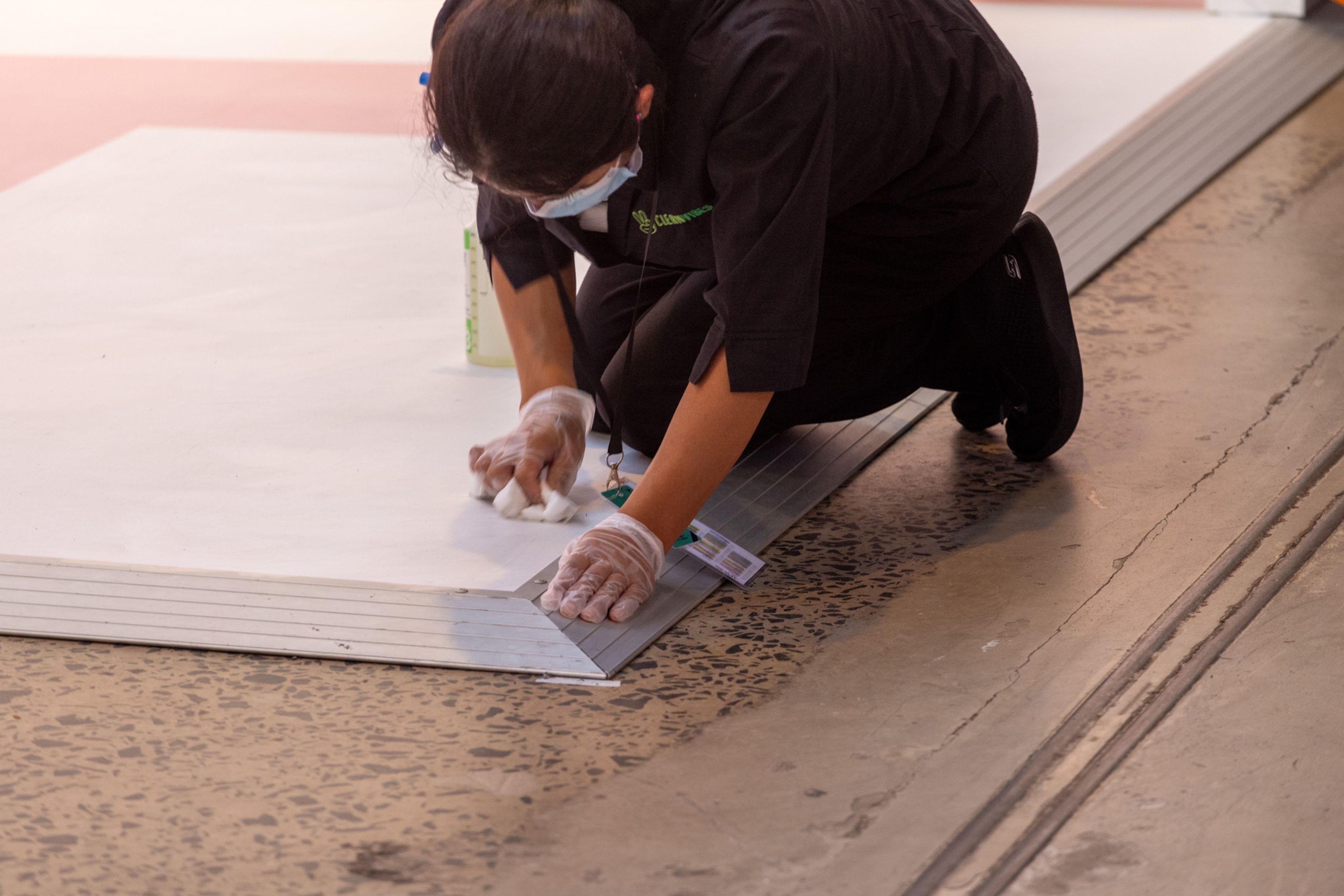 Cleaning the floor for Pandora stand at Sydney Fashion Week 2024