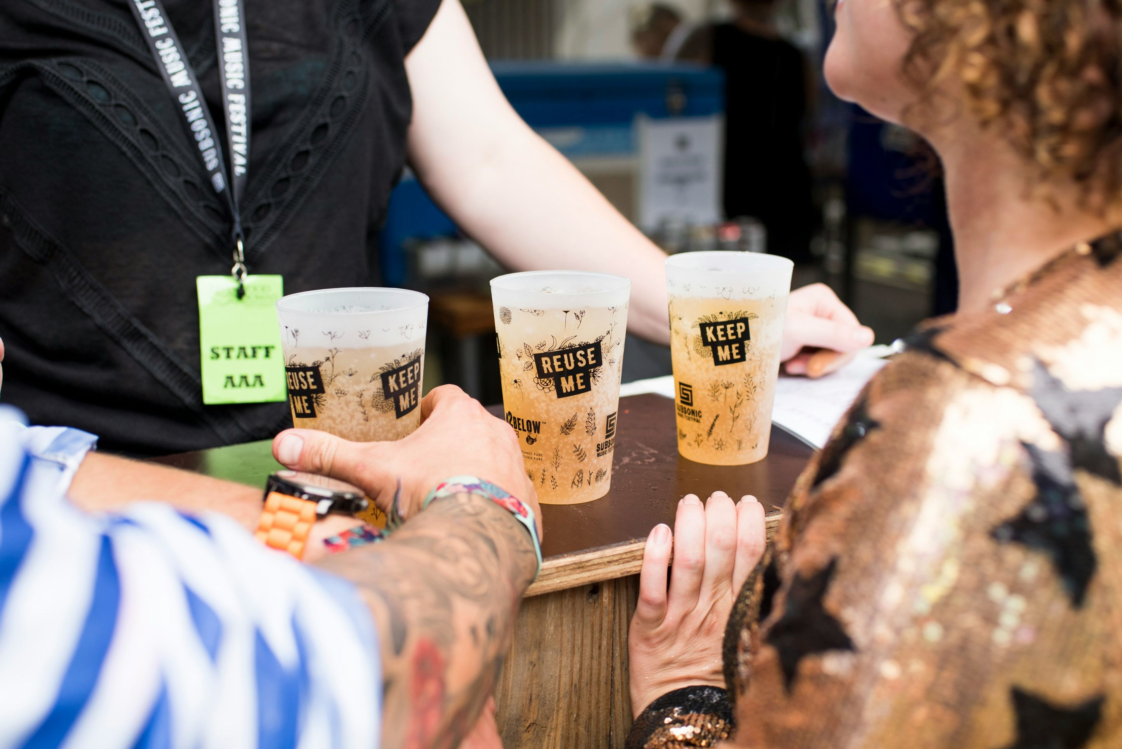 Patrons using reusable cup at music festival