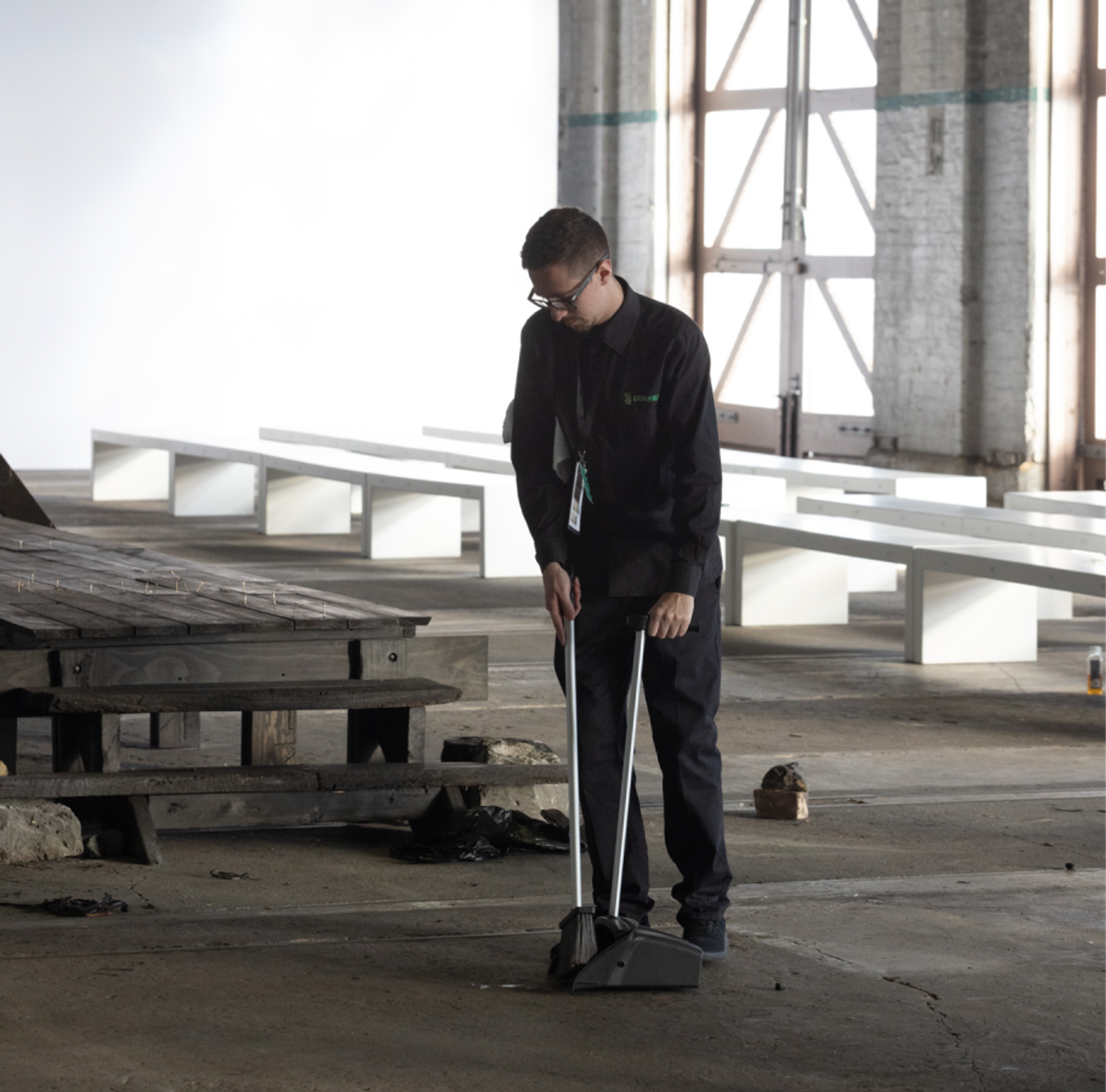 Clean Vibes employee cleaning the runway at Sydney Fashion Week 2024