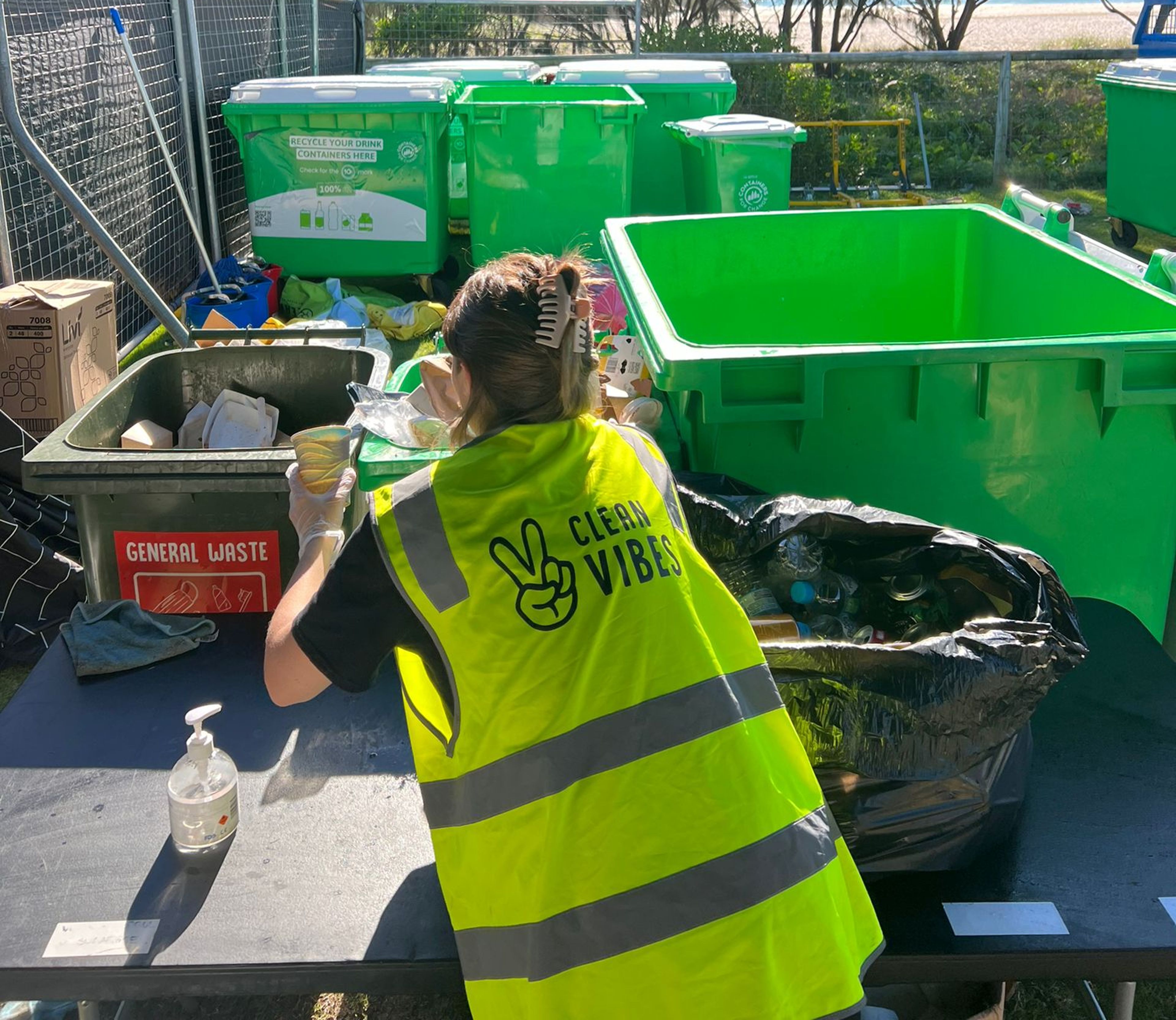 Clean Vibes staff at compound sorting wastes