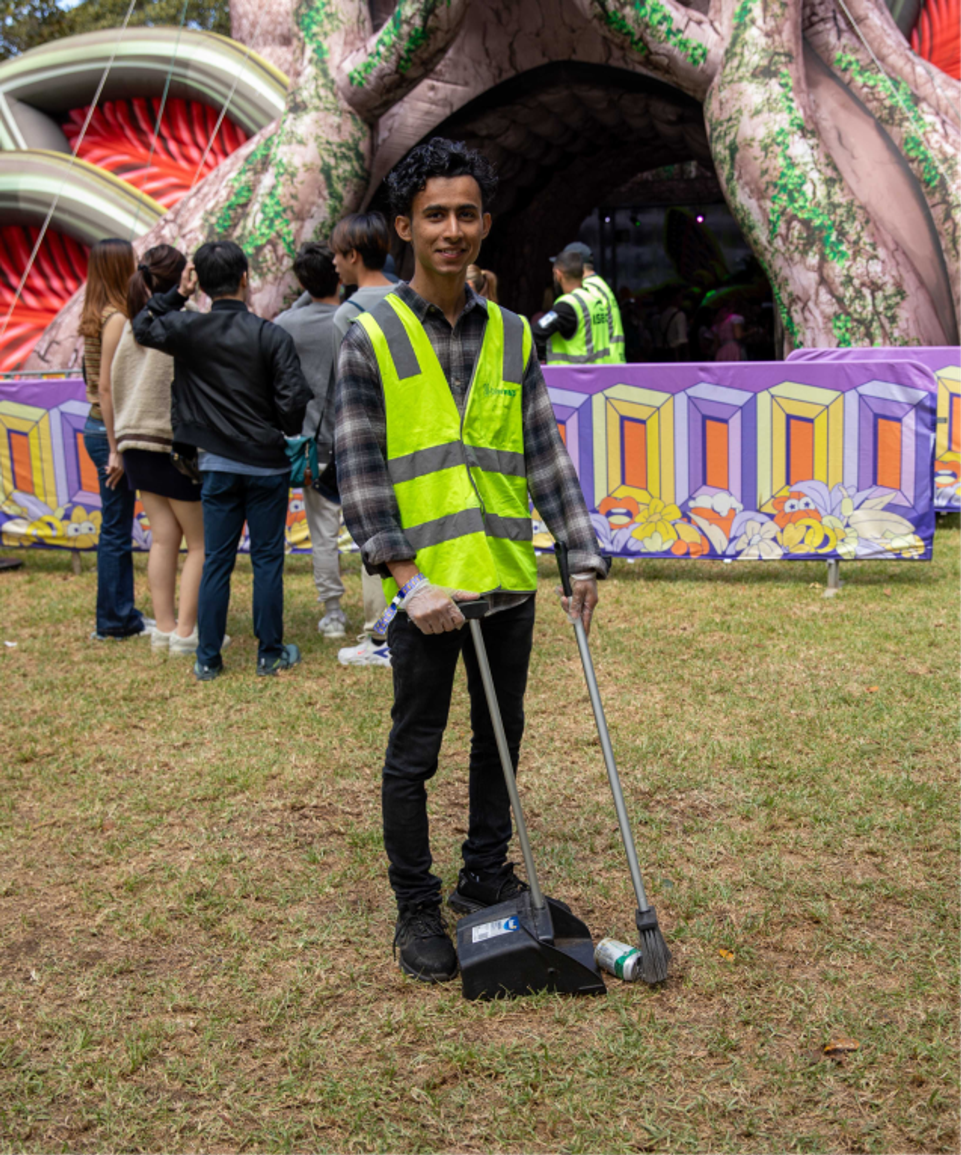 Clean Vibes employee sweeping