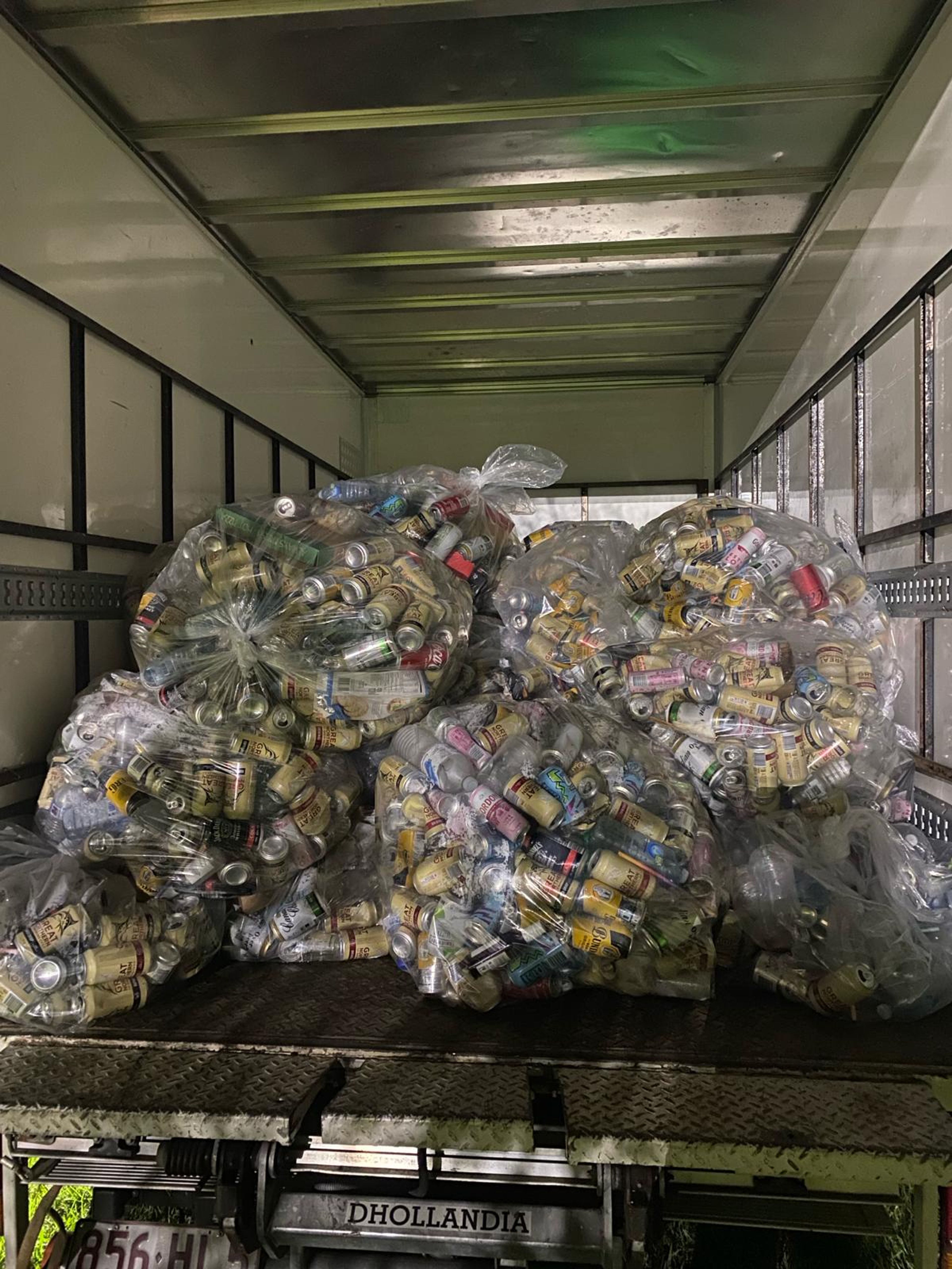Bags full of empty drink containers in truck