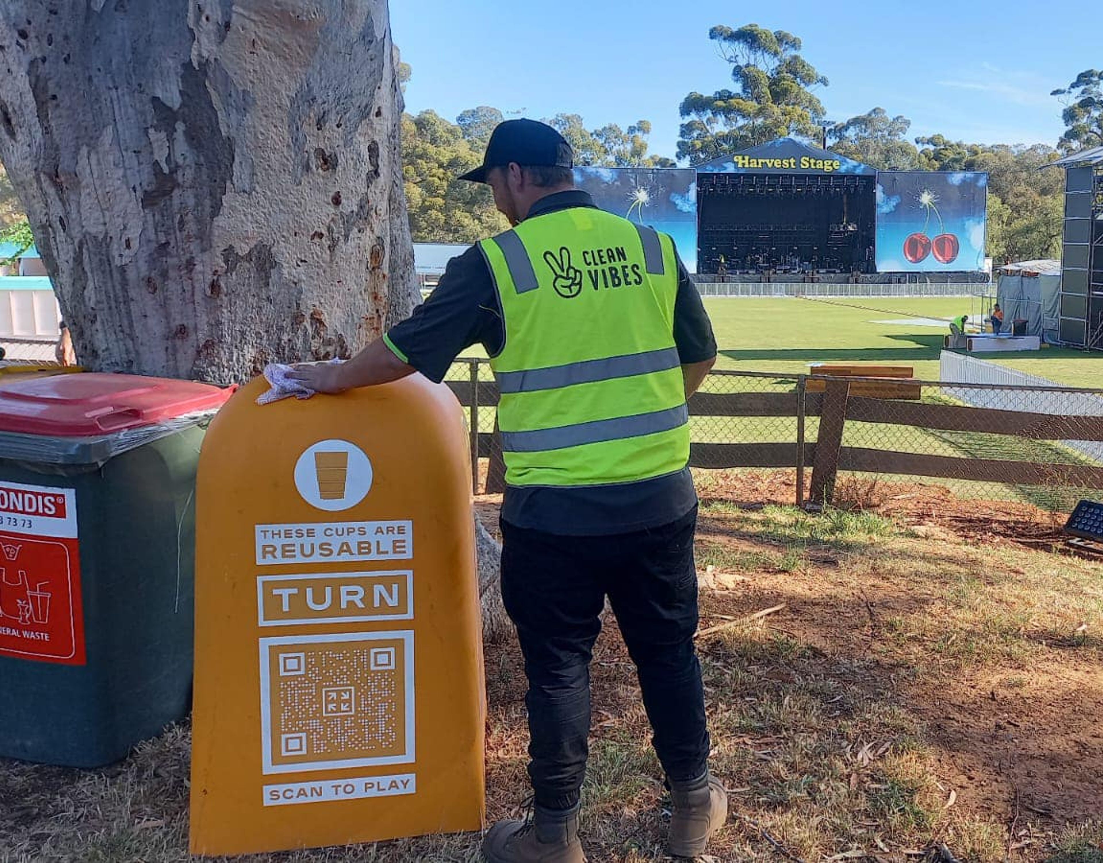 Clean Vibes casual staff cleaning TURN reusable cup recycling bin