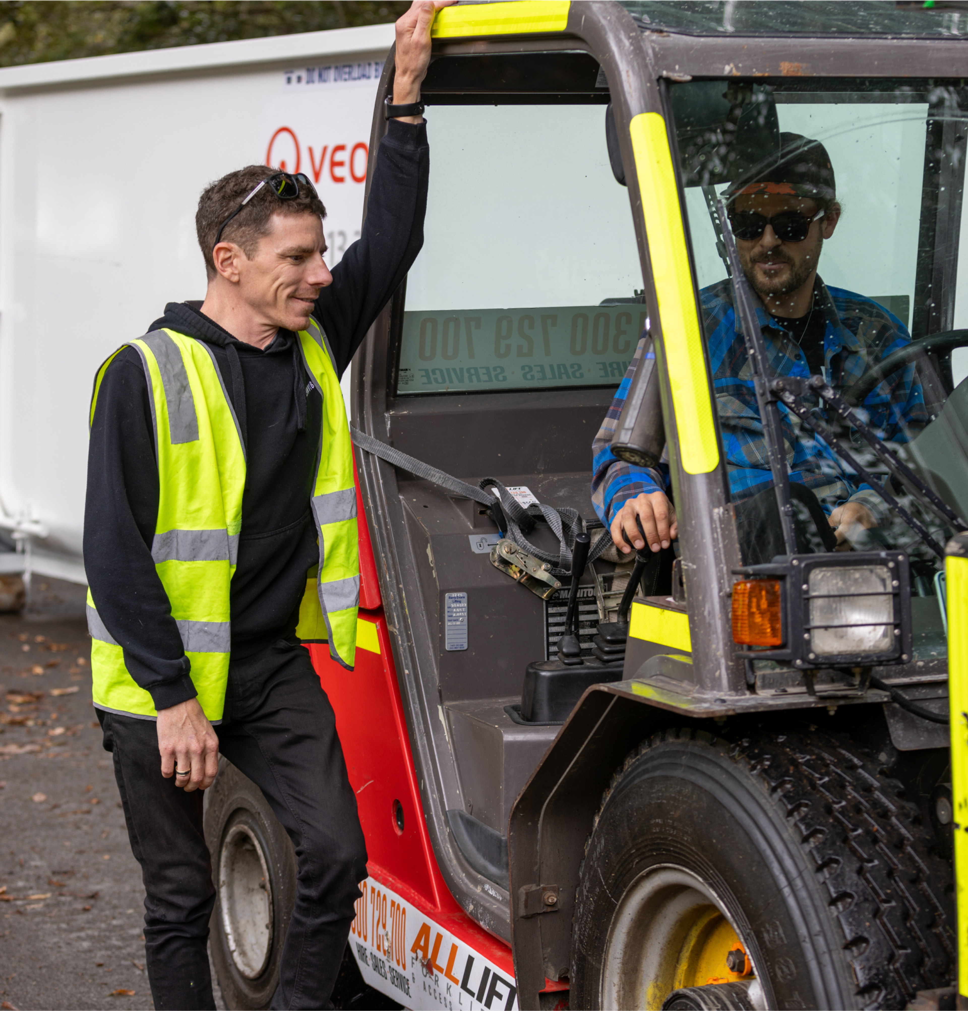 Clean Vibes staffs at compound driving truck