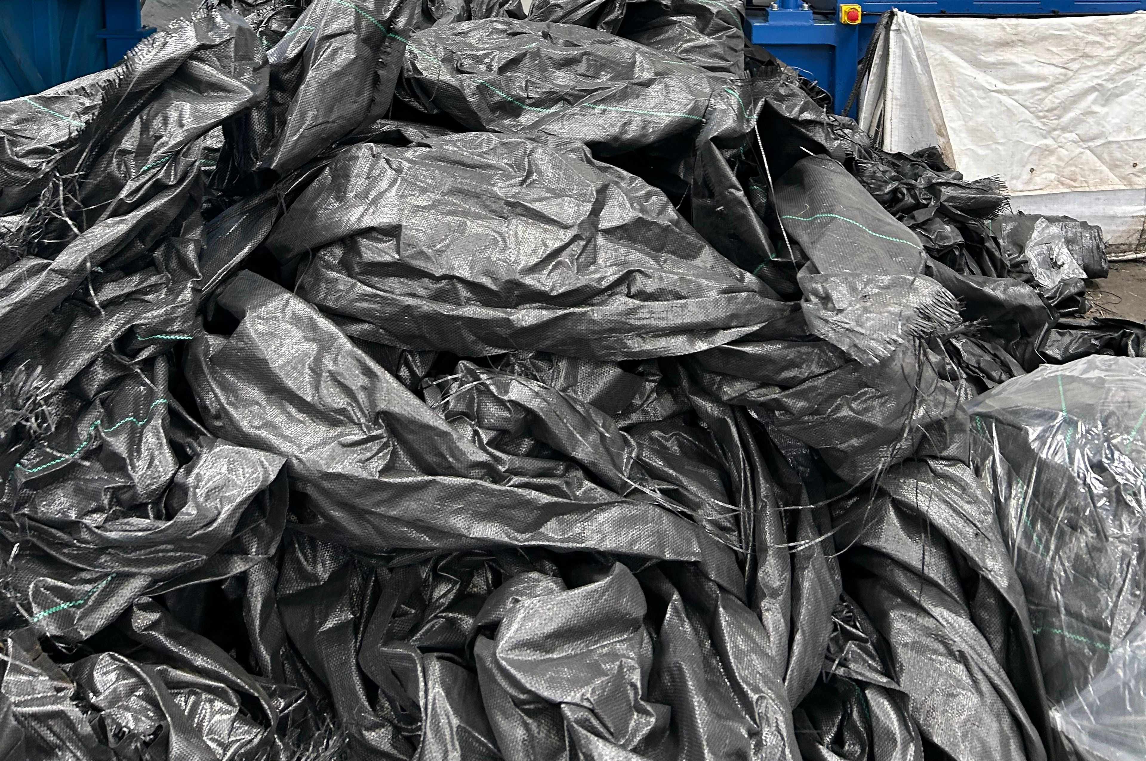 Fence scrim shredded for recycling purpose