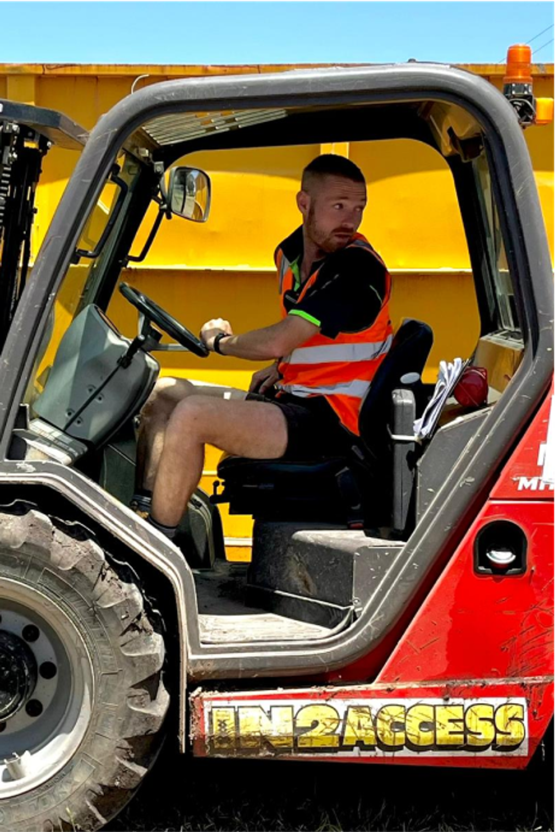 Clean Vibes staff driving truck at festival