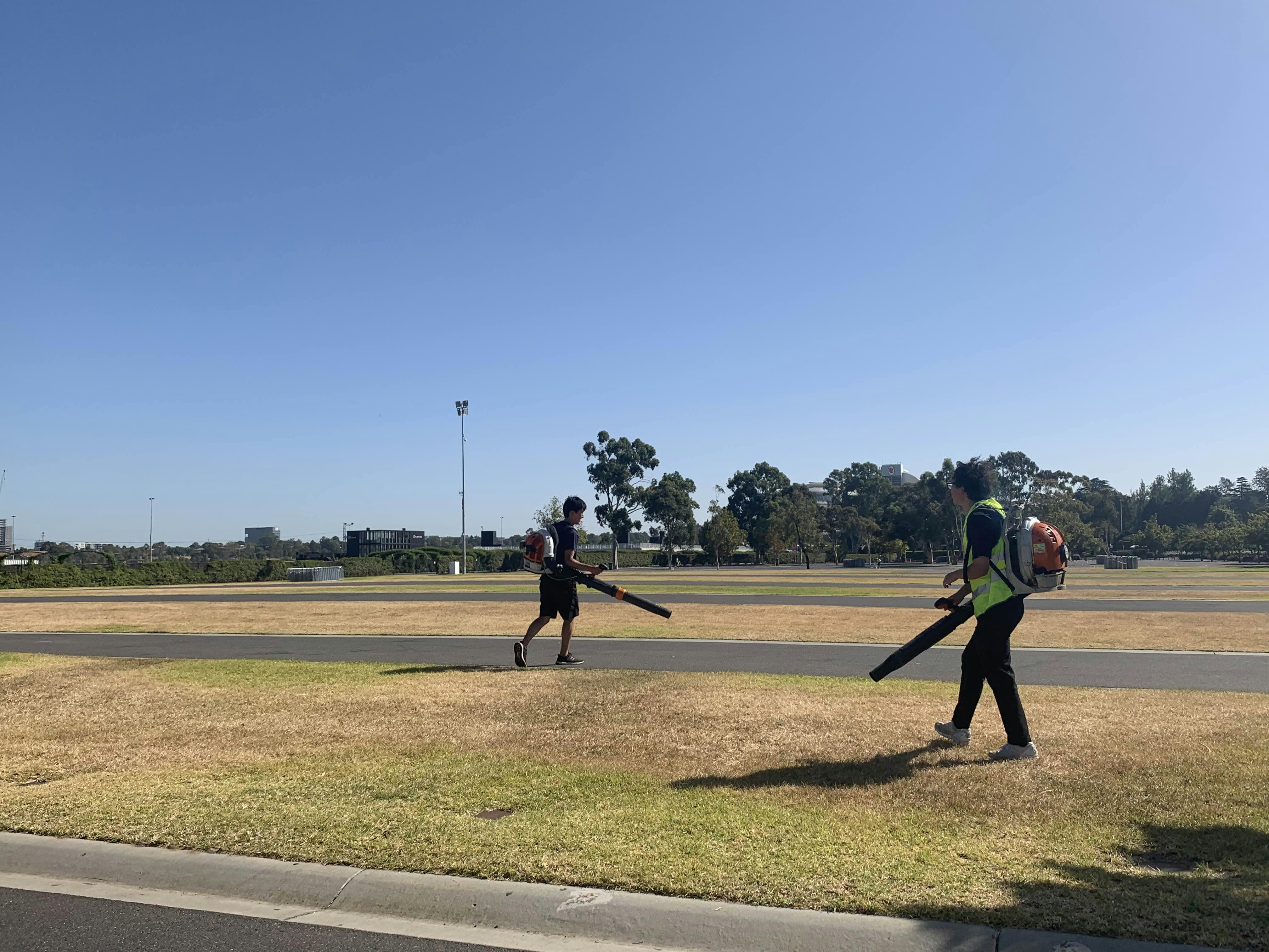 Clean Vibes staffs using cleaning equipment 