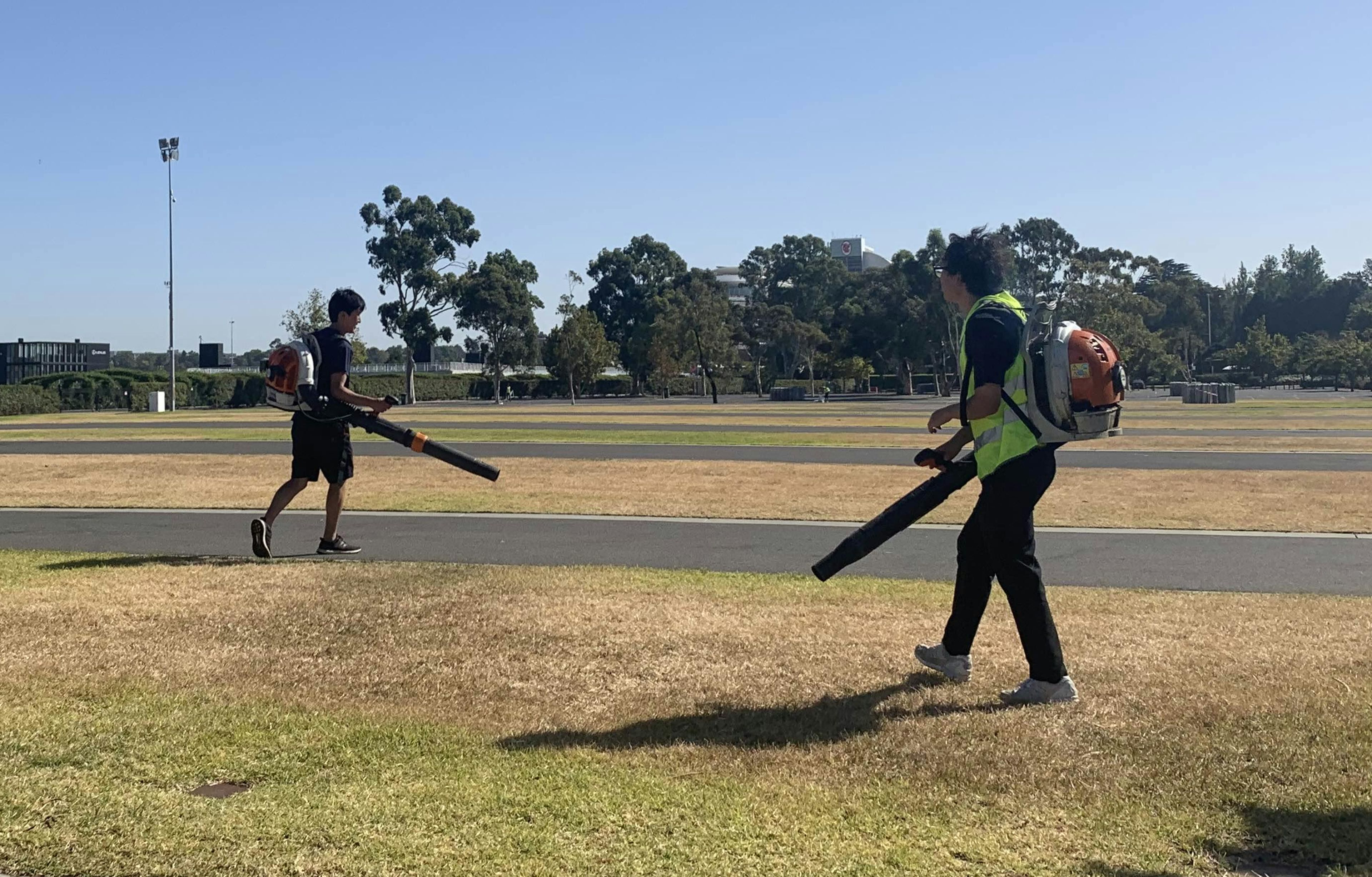 Clean Vibes staffs using cleaning equipment