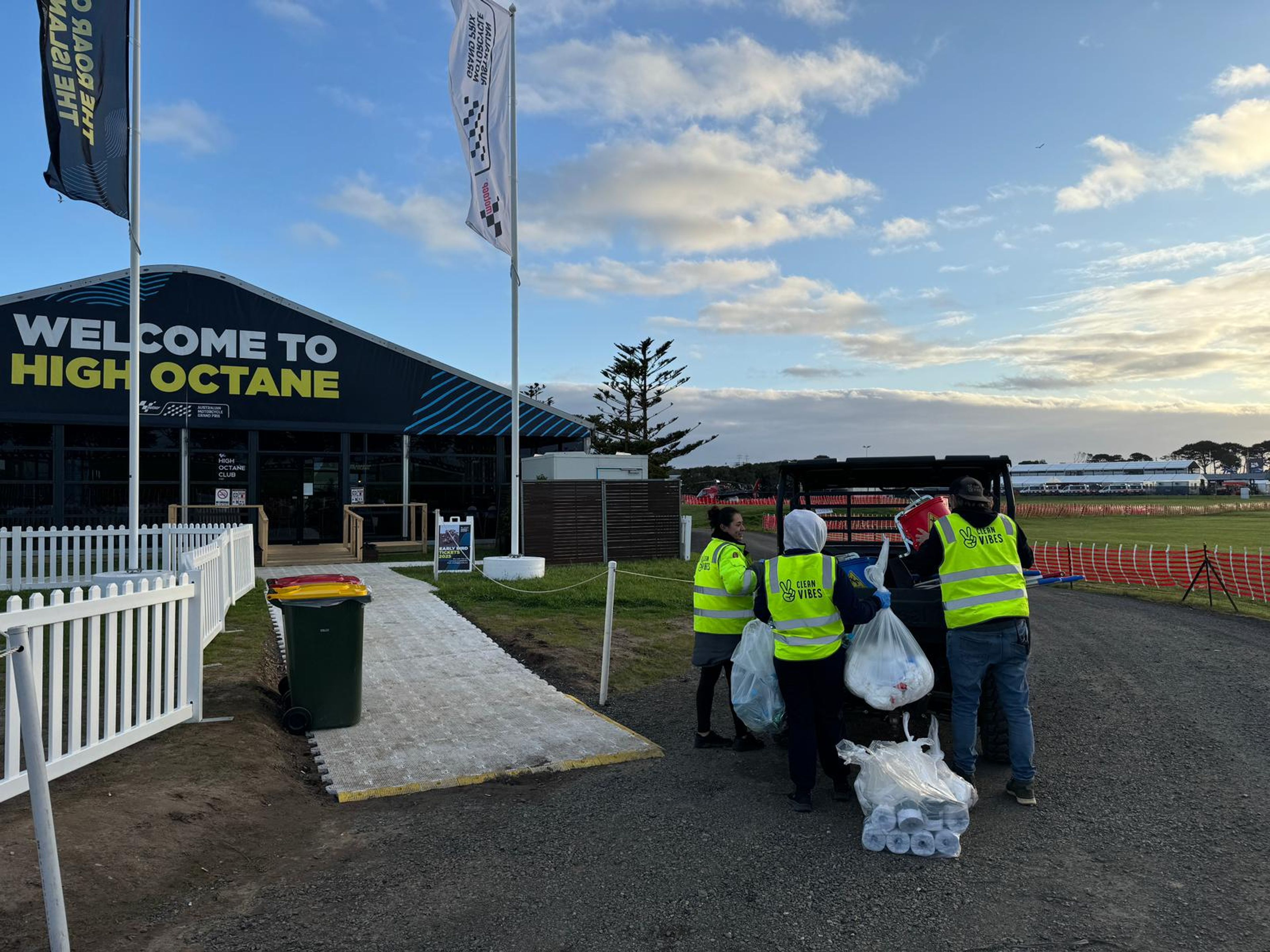 Clean Vibes staff loading cleaning essentials onto driving cart