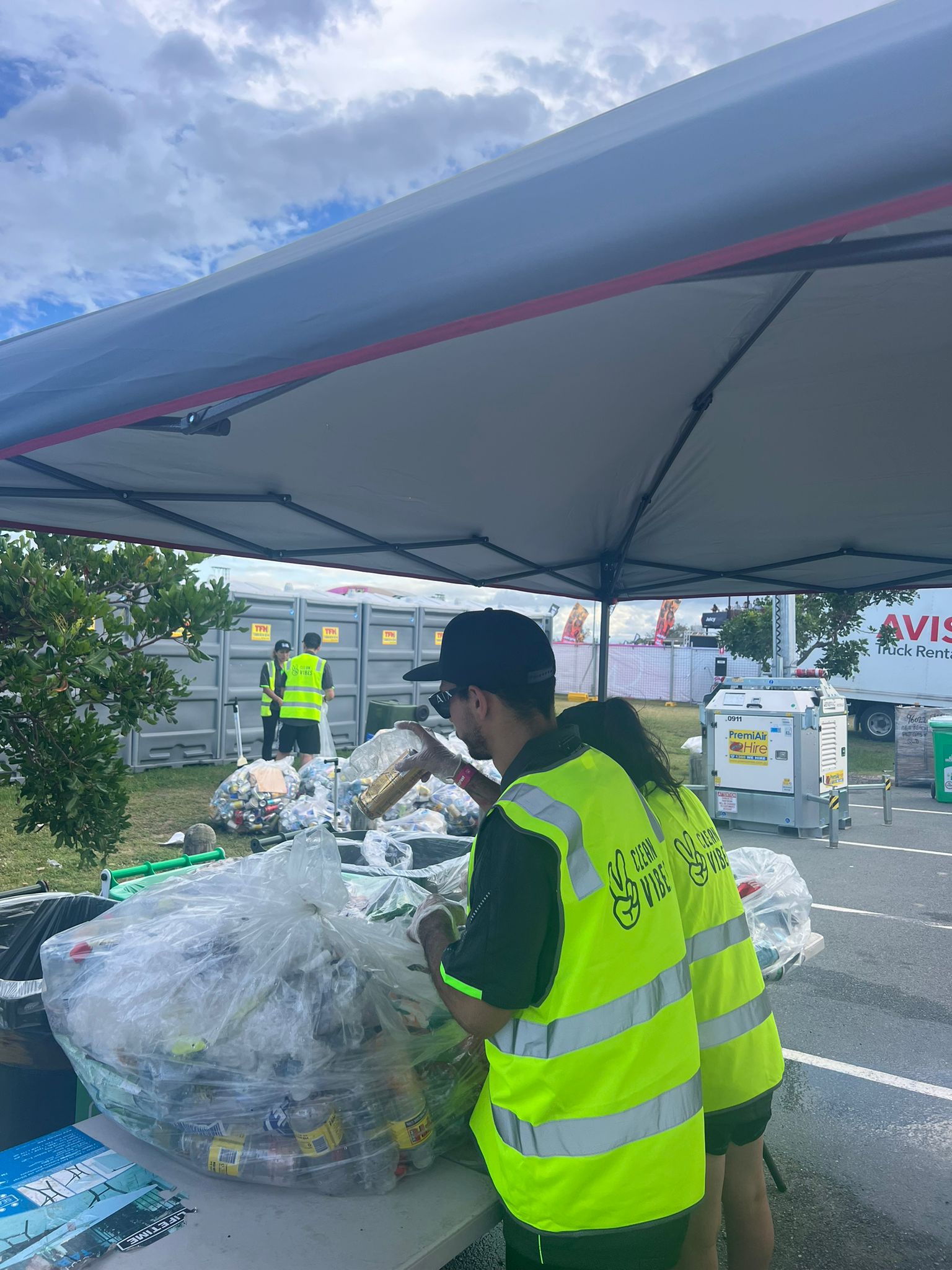 Clean Vibes staffs cleaning at the back of house of event