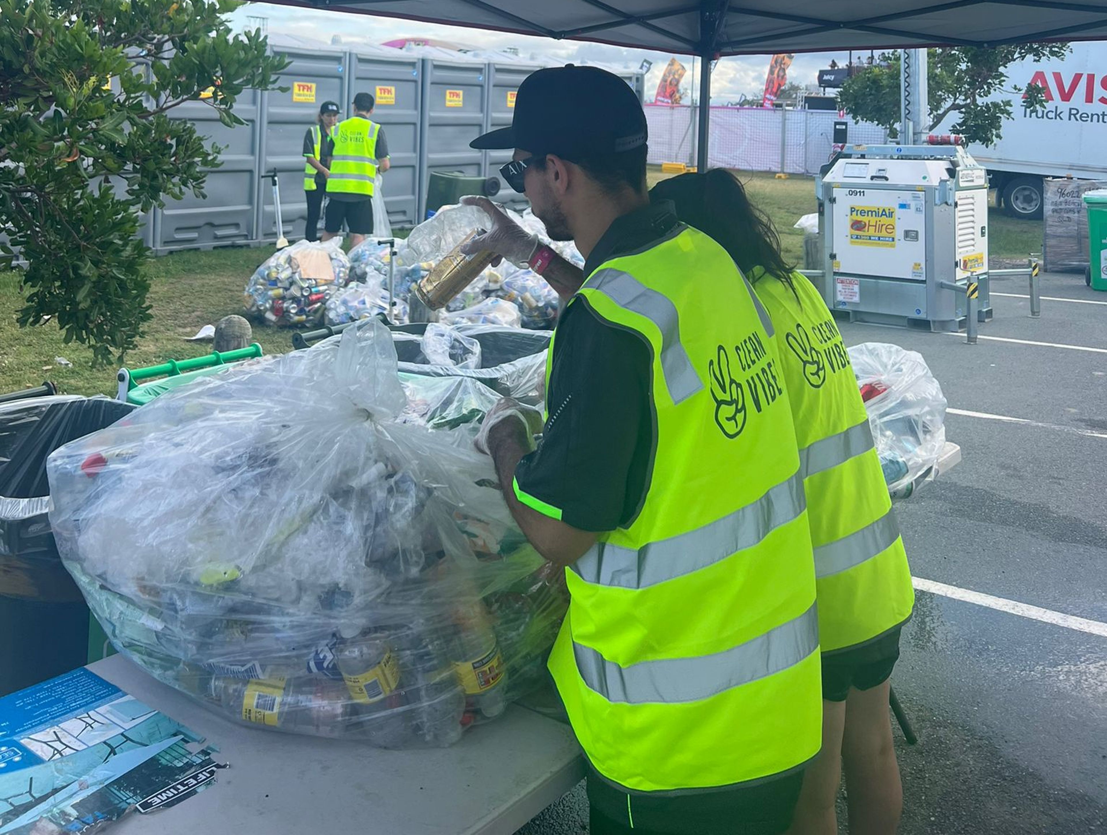 Clean Vibes staffs cleaning at the back of house of event