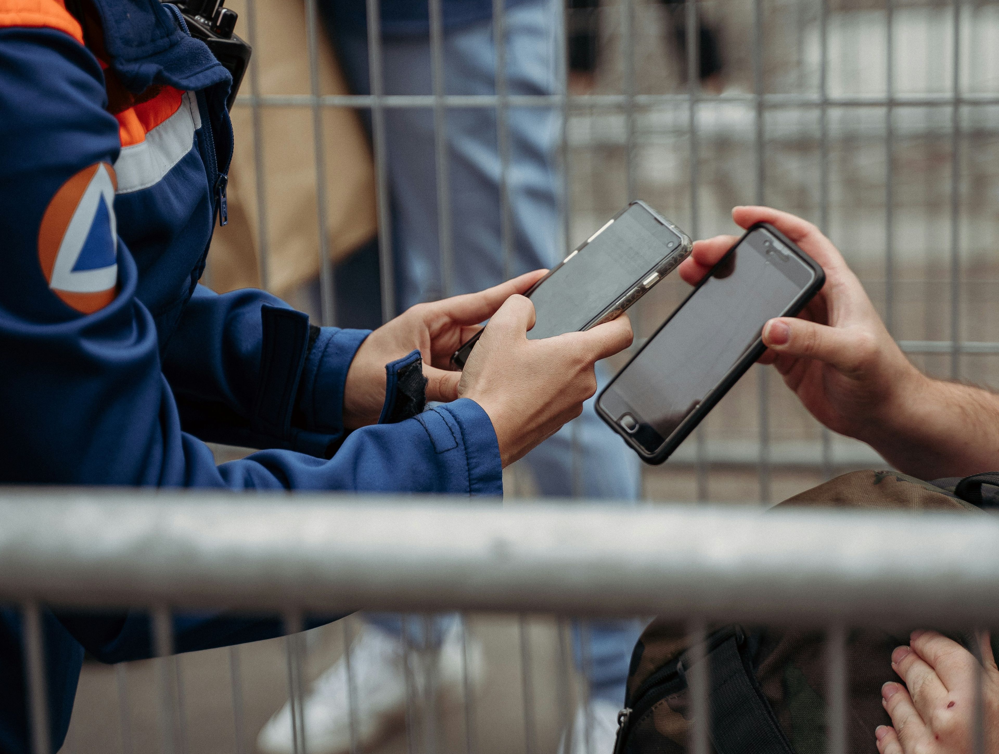 People holding mobile phones