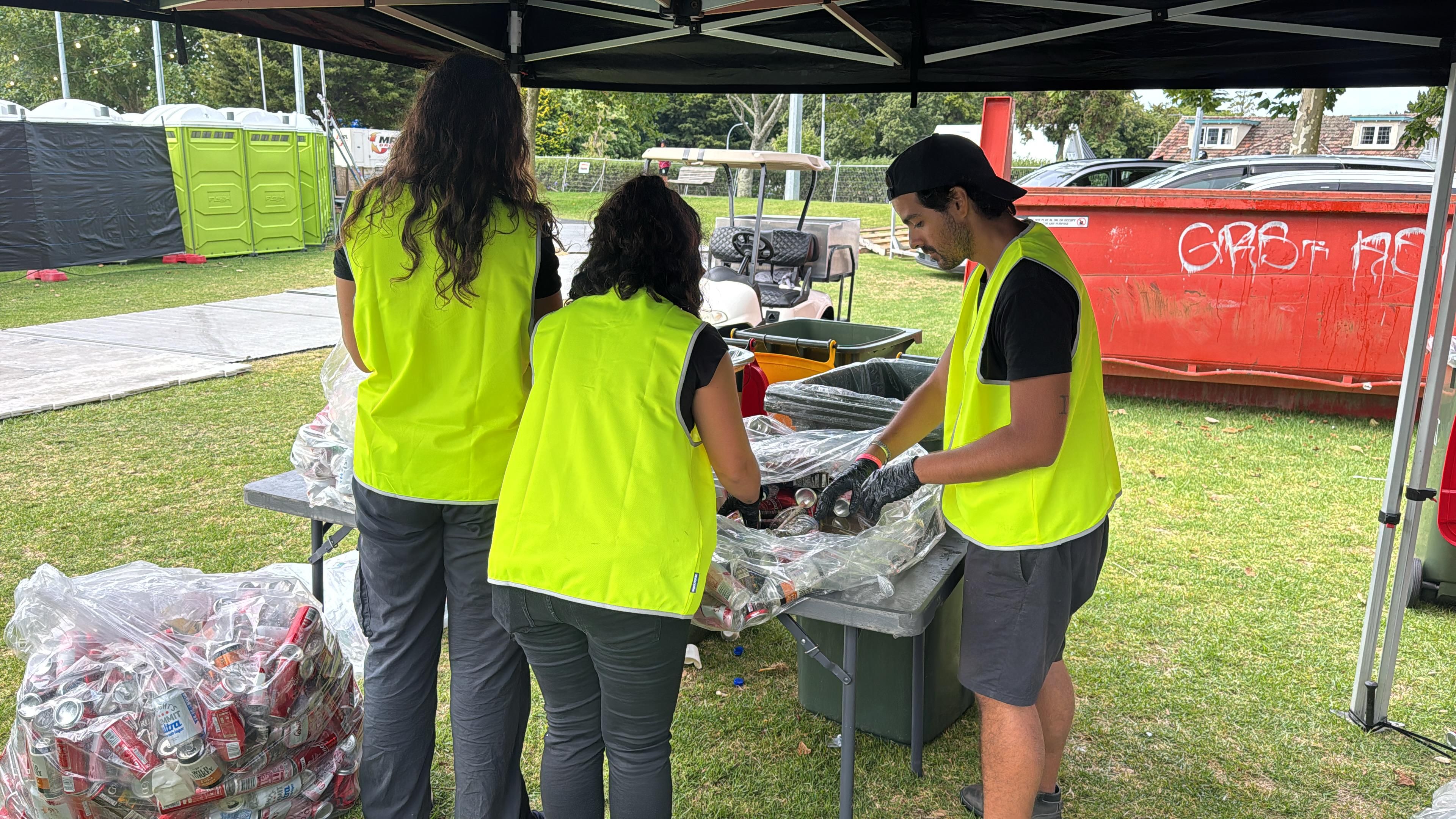 Clean Vibes staffs sorting cans from general waste