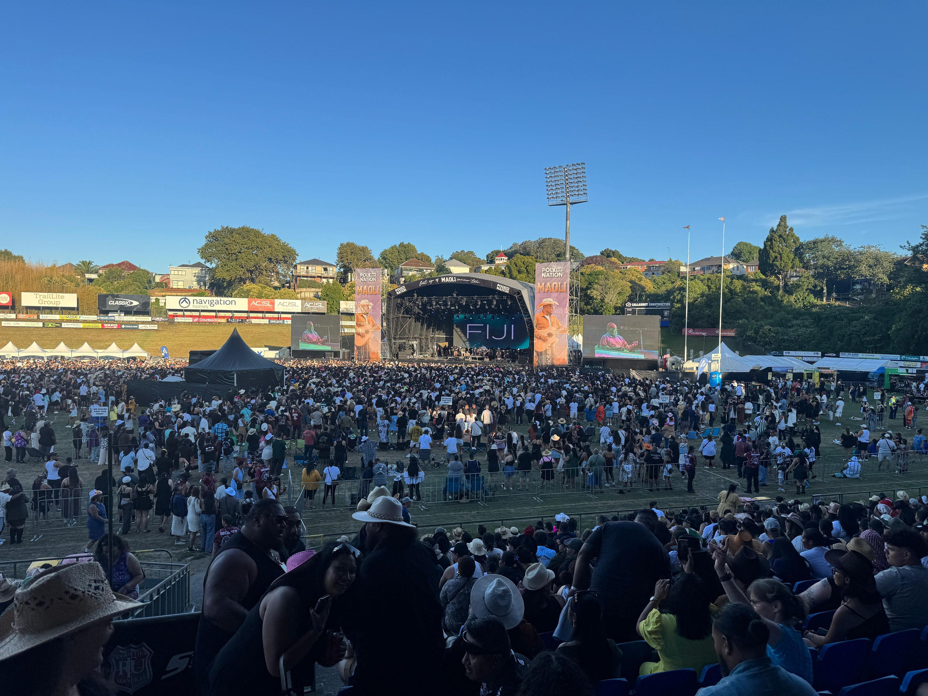 people gathering around Maoli’s stage