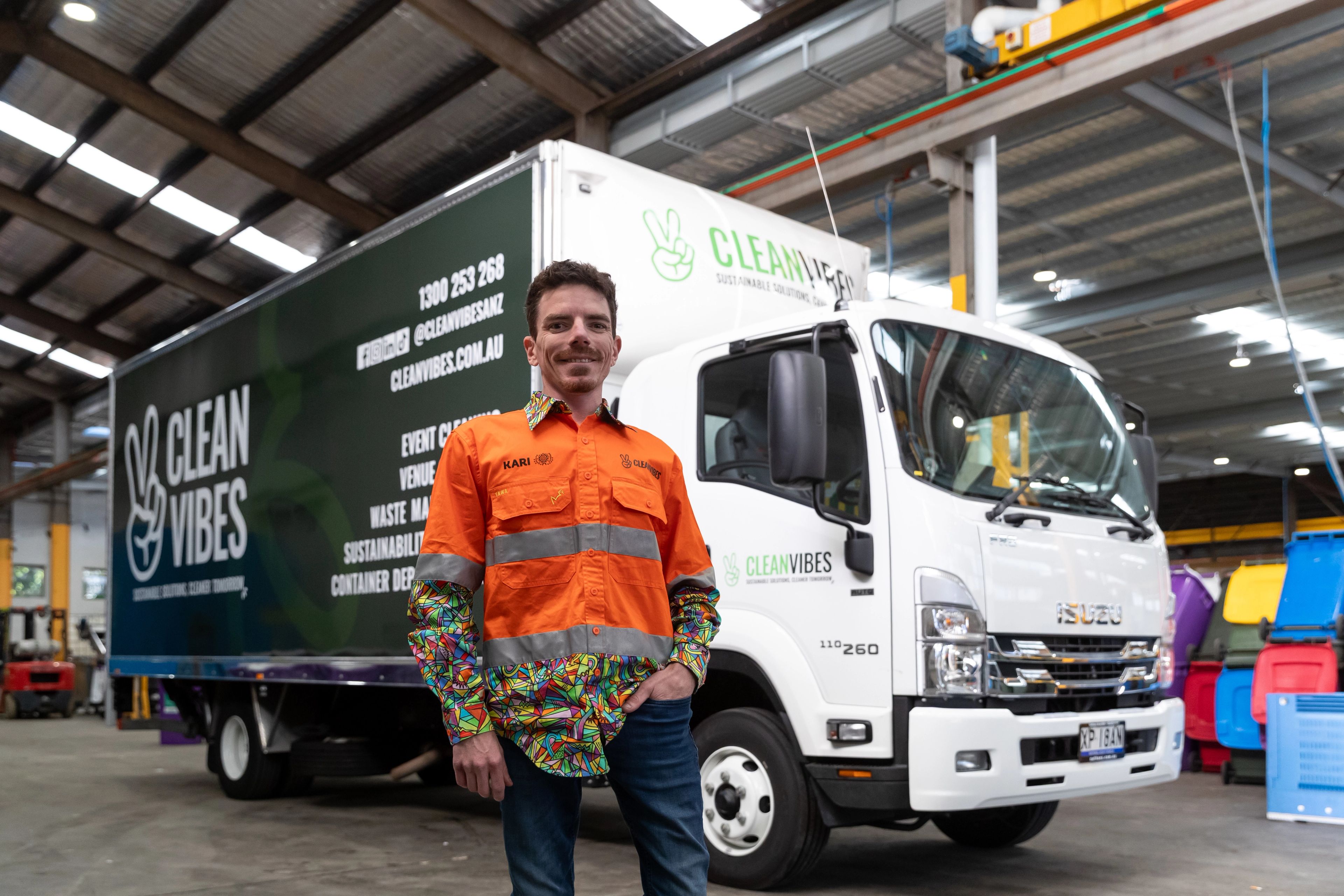 Clean Vibes staff standing with Clean Vibes truck 