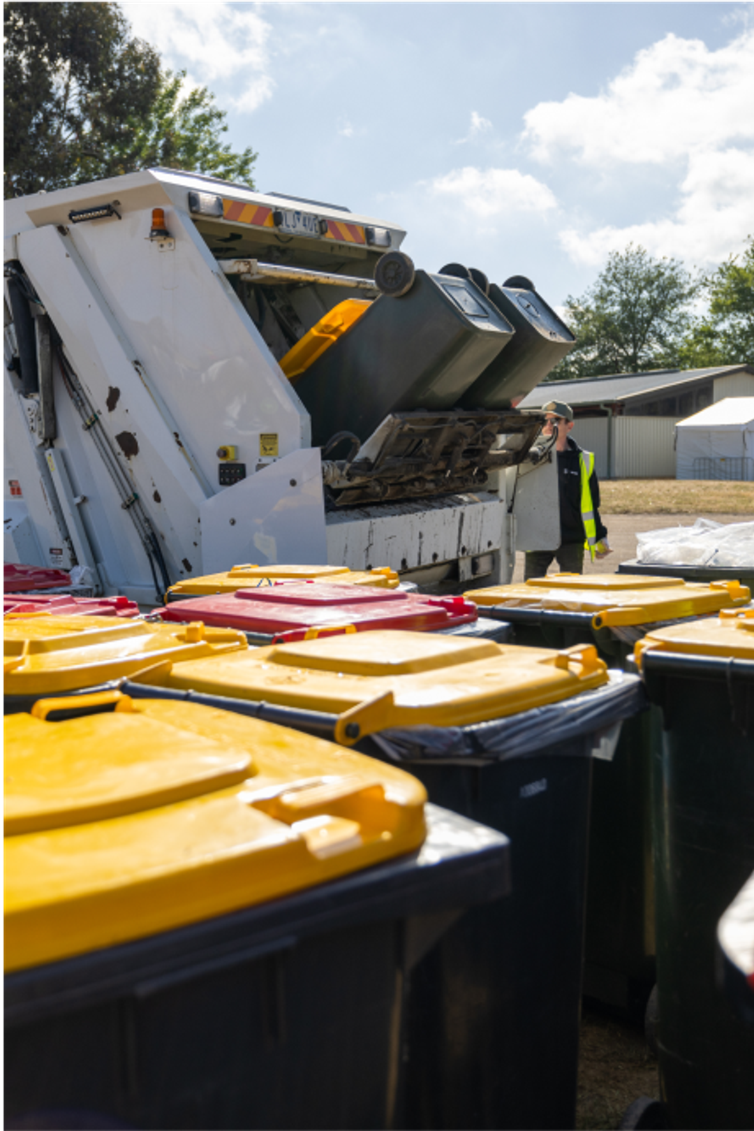 Bins being emptied in a truck