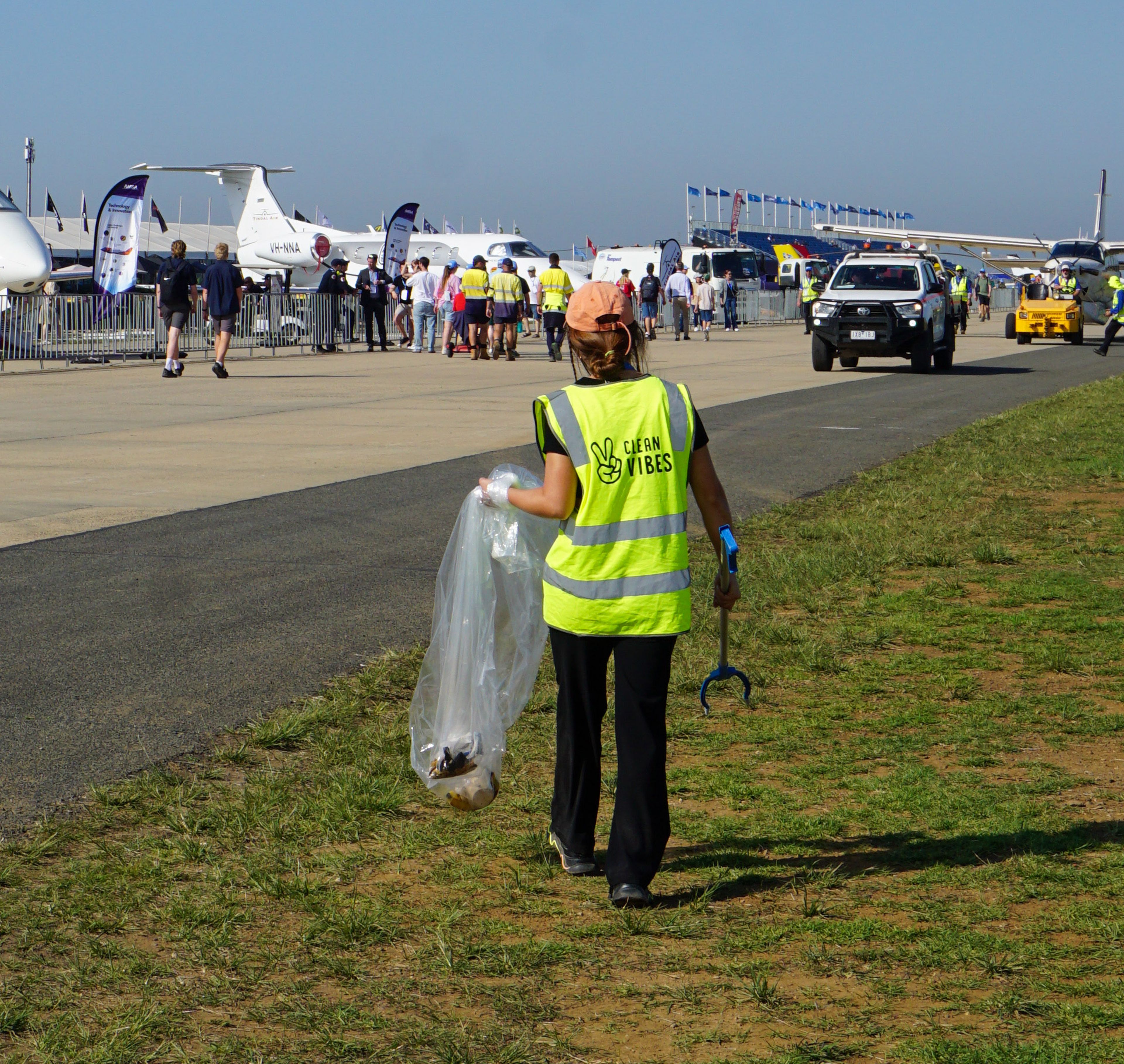 Clean Vibes staff literpicking at Avalon Airshow