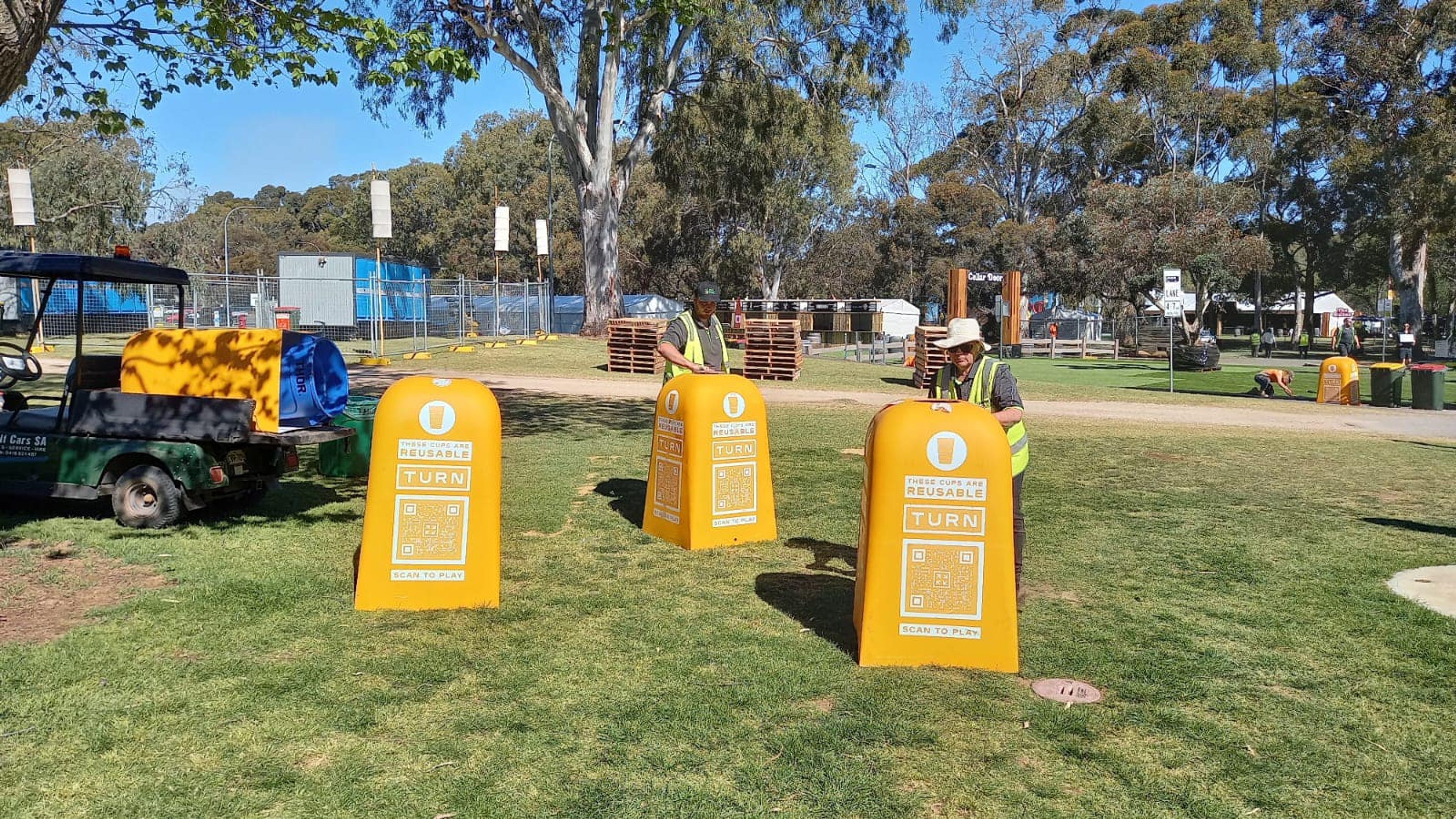 Clean Vibes staff cleaning TURN reusable cup recycling bin