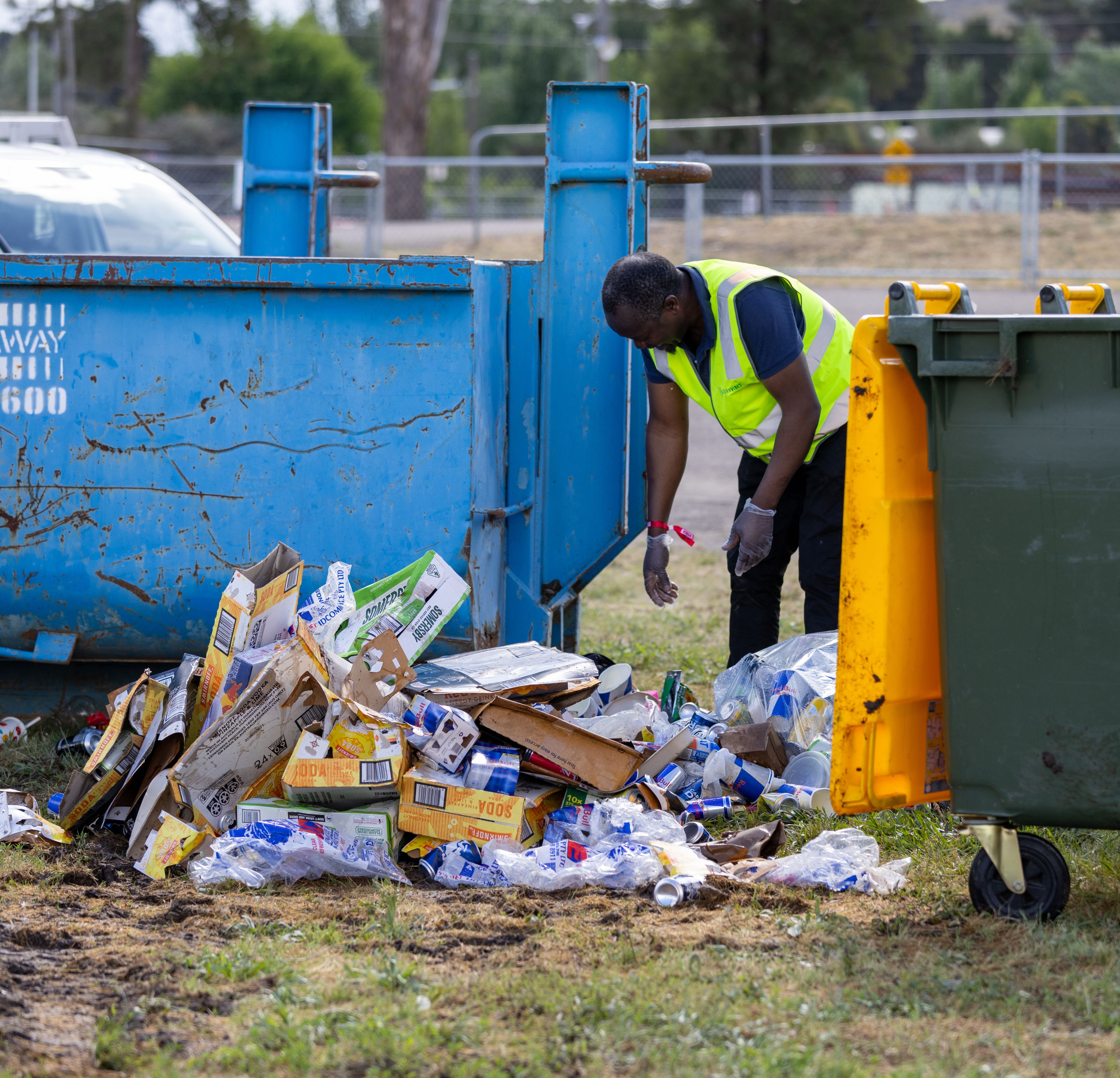 Clean Vibes staff sorting trashes at compound