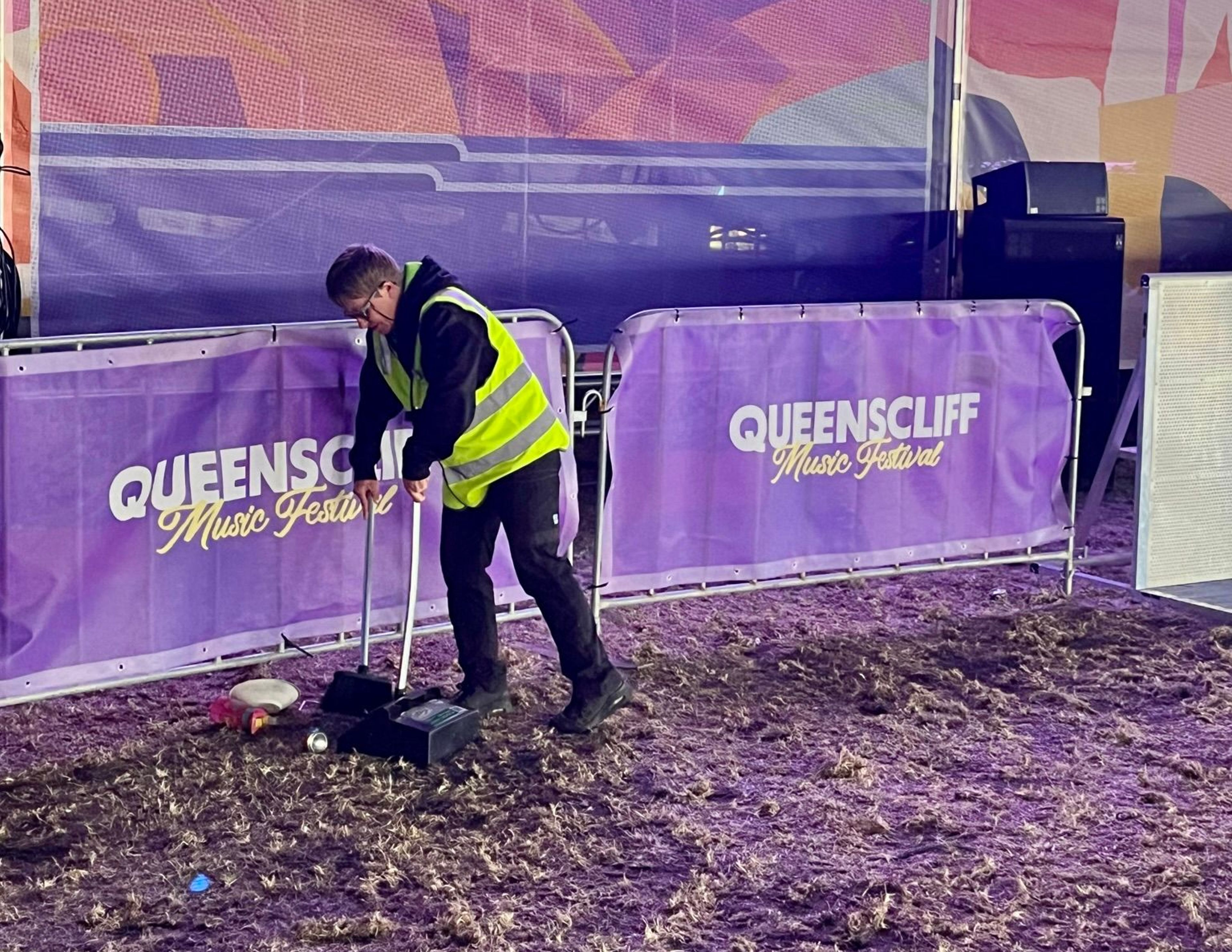 Clean Vibes staff sweeping the floor