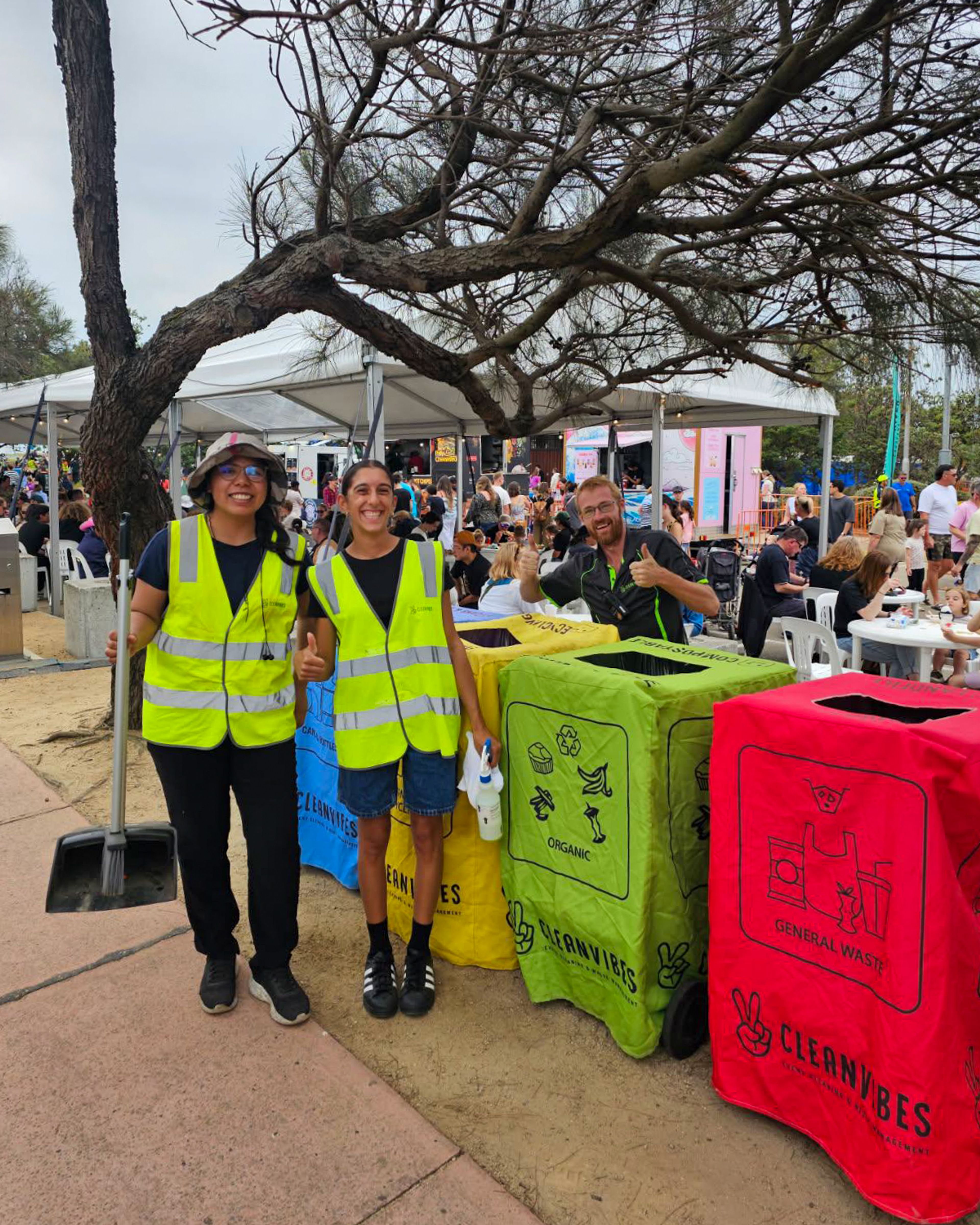 Clean Vibes employees sweeping