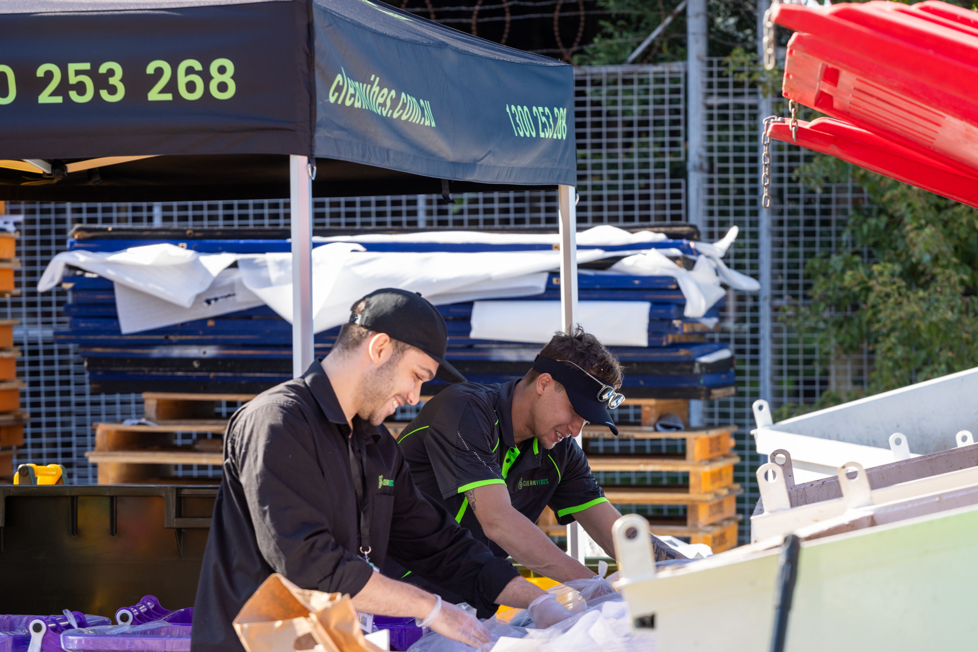 Clean Vibes staffs sorting trashes from bins