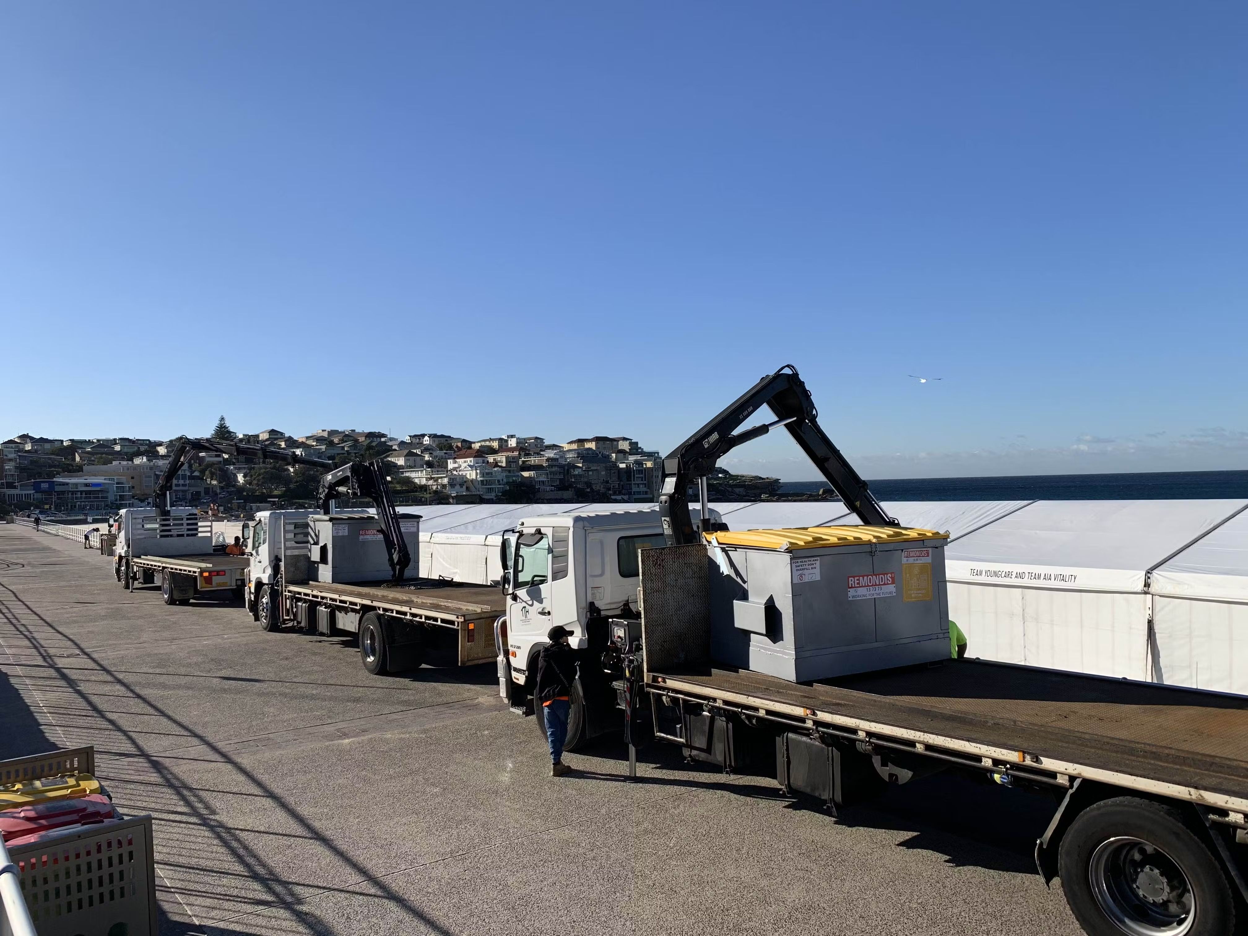 Clean Vibes trucks at Bondi beach unloading a few skip bins pre-event 