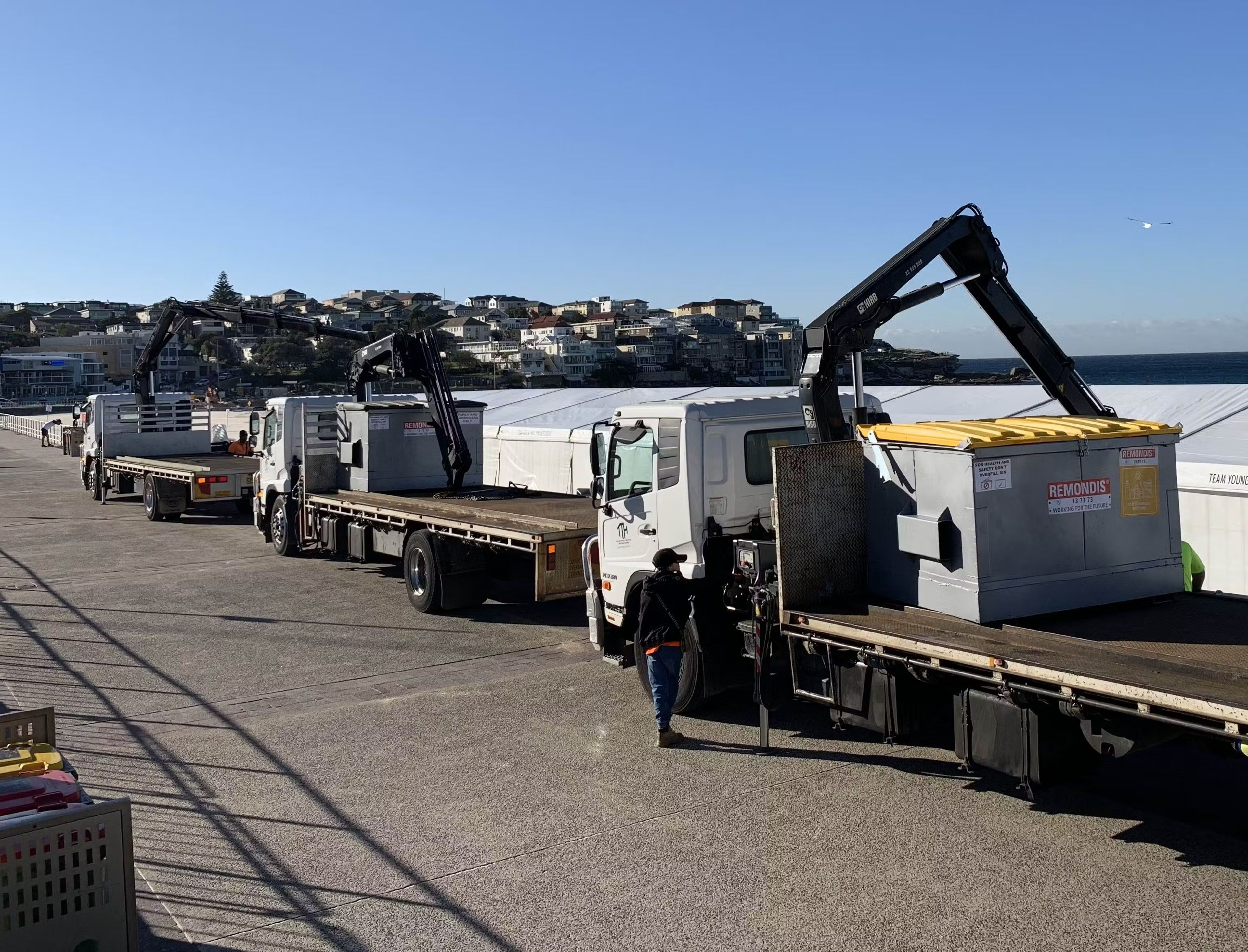 Clean Vibes trucks at Bondi beach unloading a few skip bins pre-event