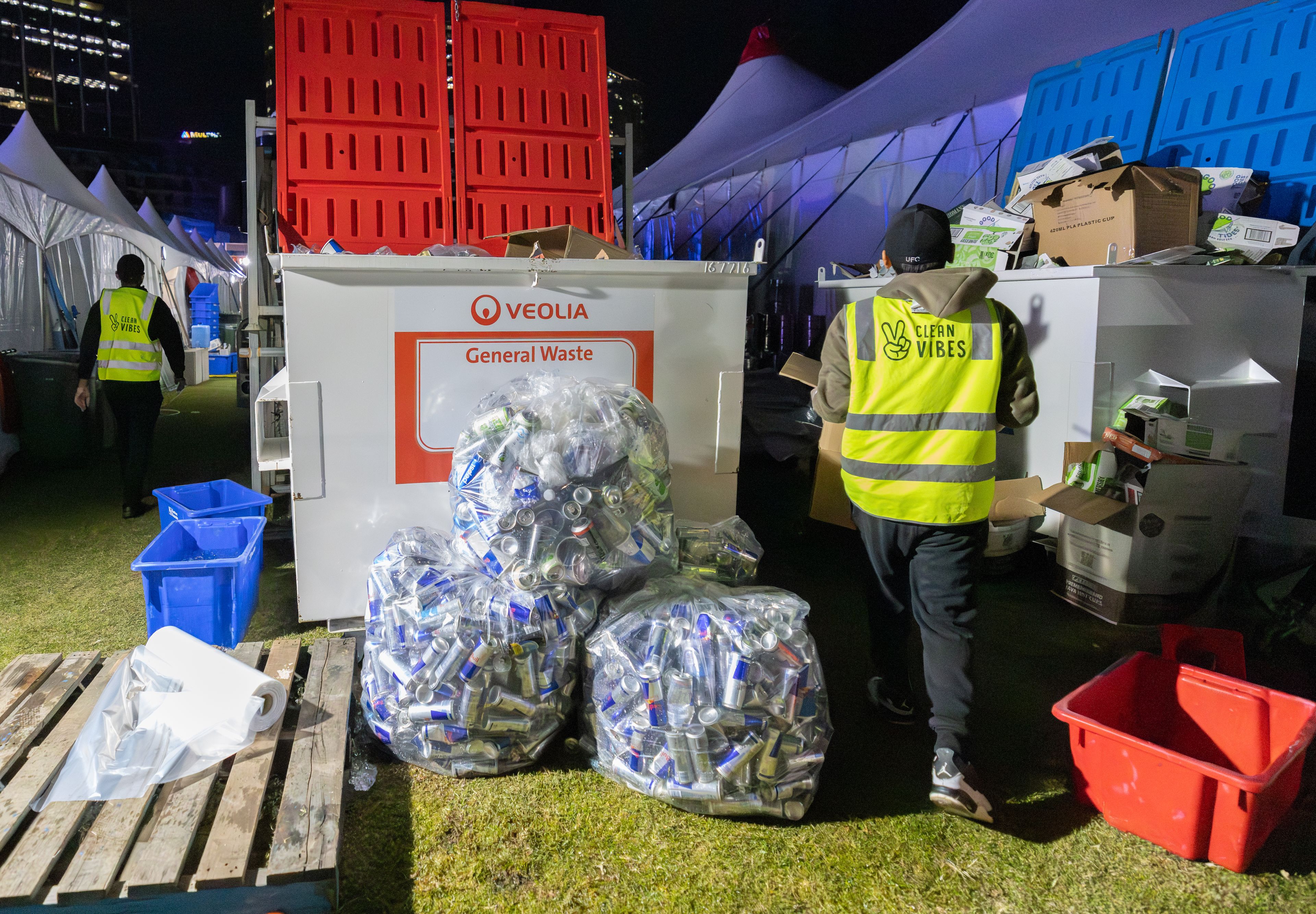 Clean Vibes staffs at compound sorting general waste and recyclable items