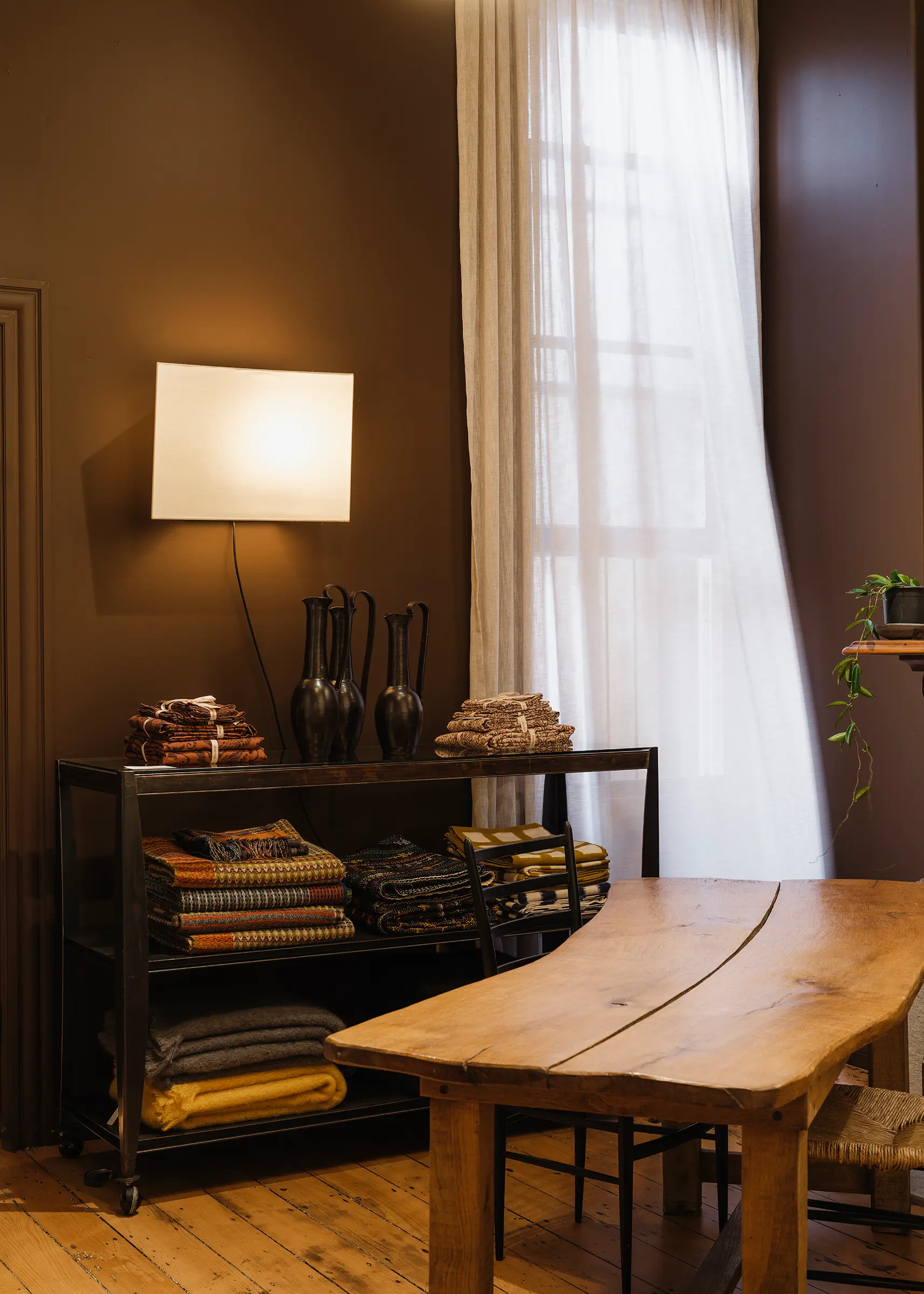 Interior of Handcrafted Modern featuring Aalto's Forest Floor walls, handcrafted textiles, vintage furniture and contemporary craft.