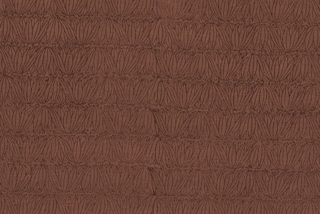 a close up of the Studio ford sphinx tablecloth print in warm brown