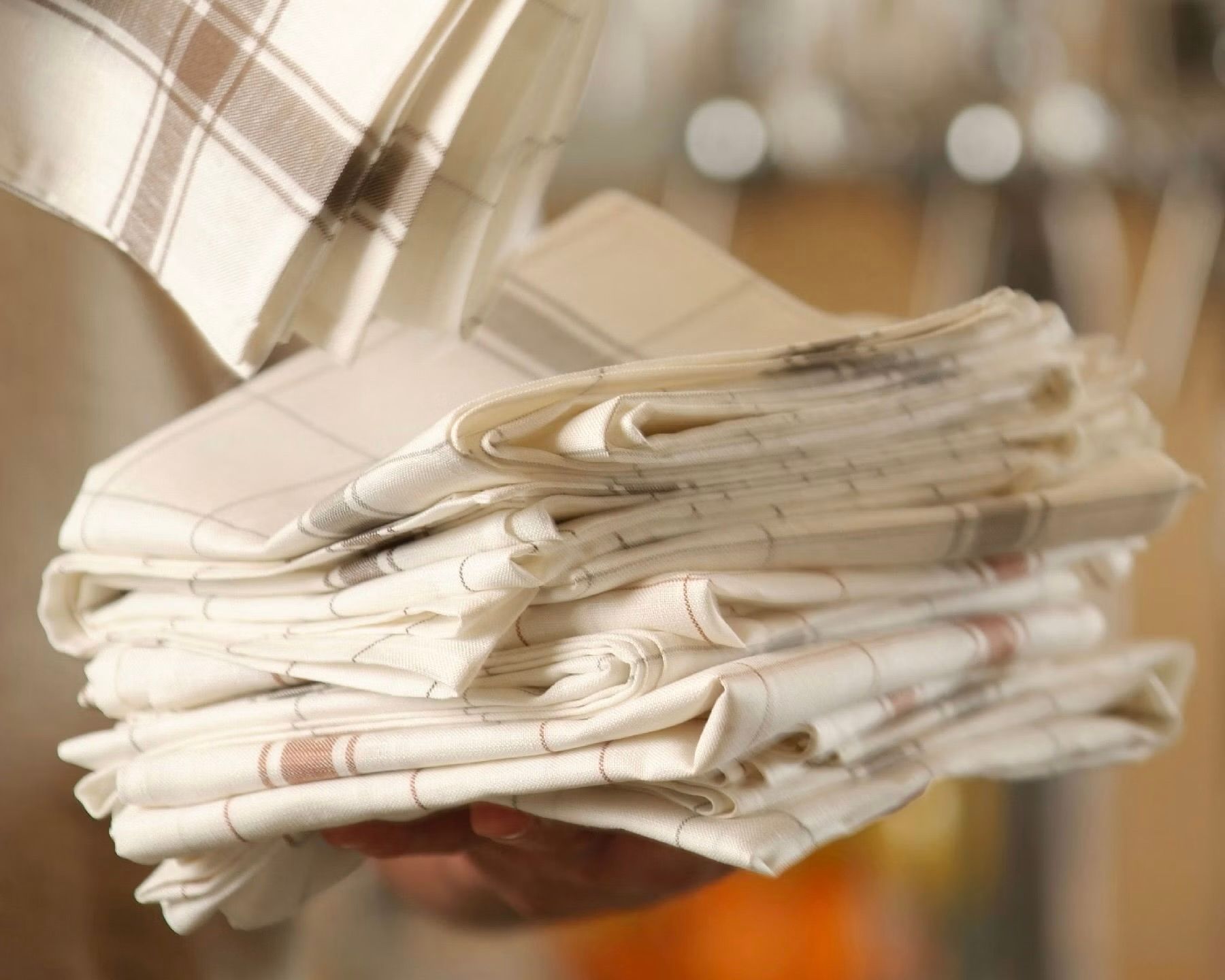 A close up of the Libeco parma tea towel with a classic grid check, cream tea towel made from Belgium linen and cotton