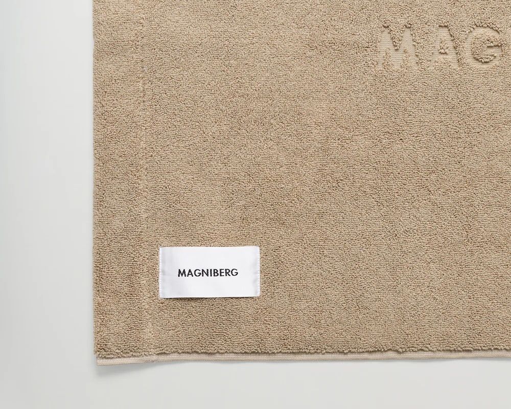 A close up of the Magniberg cone beige gelato bath mat in a heavy 950gsm weight 