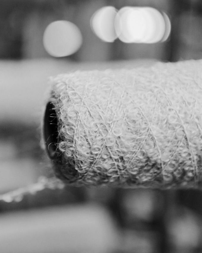 black & white photo of a spool of mohair wool 