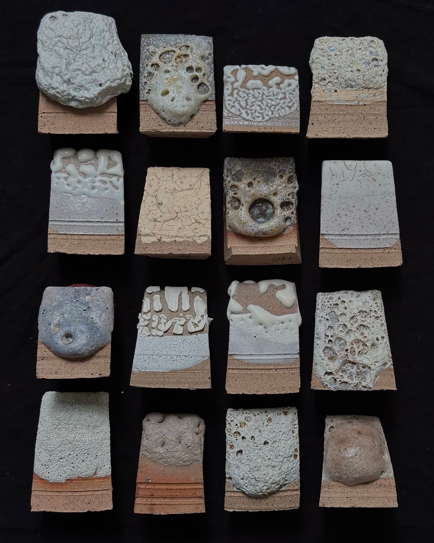swatched of different glazes shown on small tiles from Maria Loram ceramics