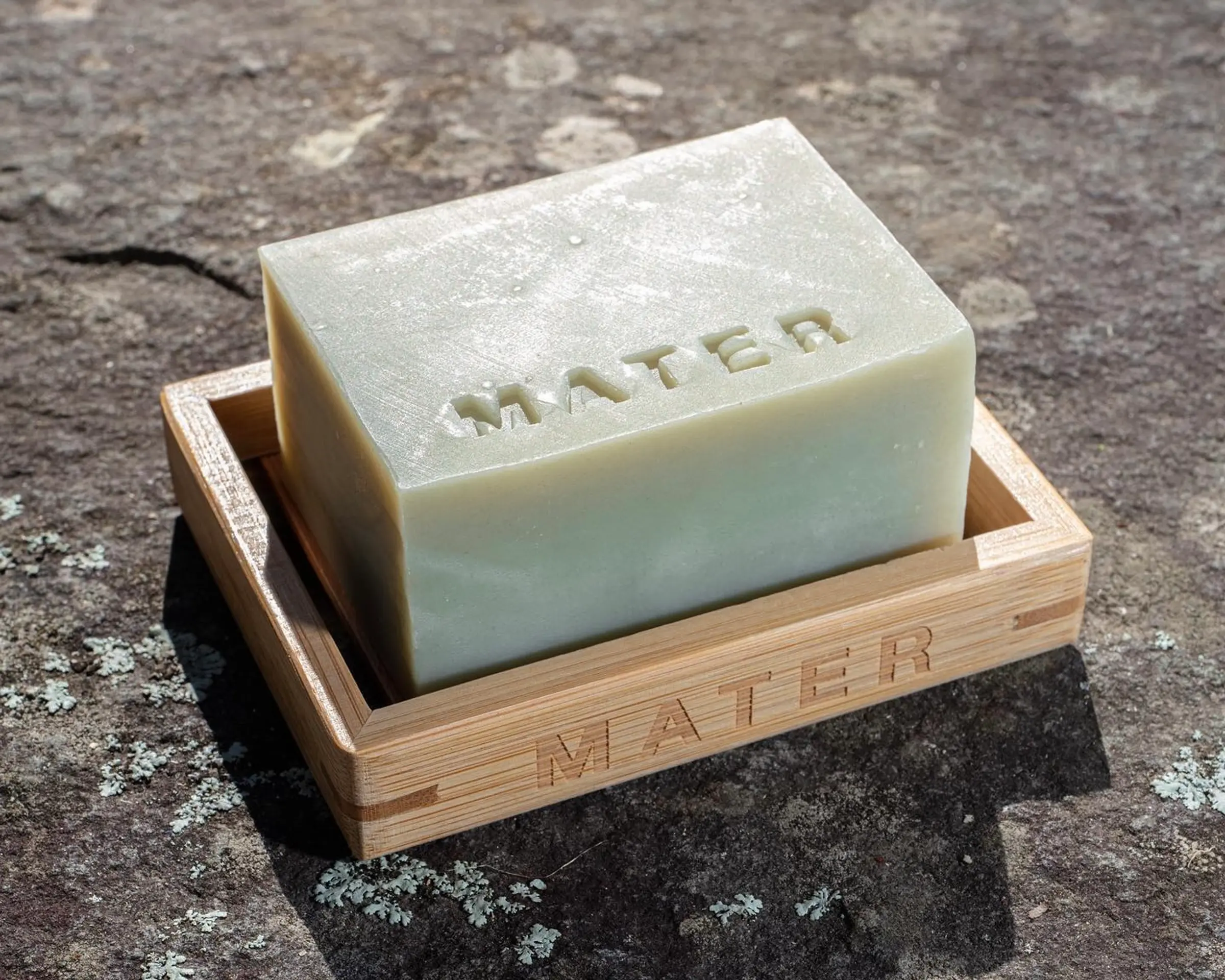 Mater kitchen block and bamboo soap dish on a rock