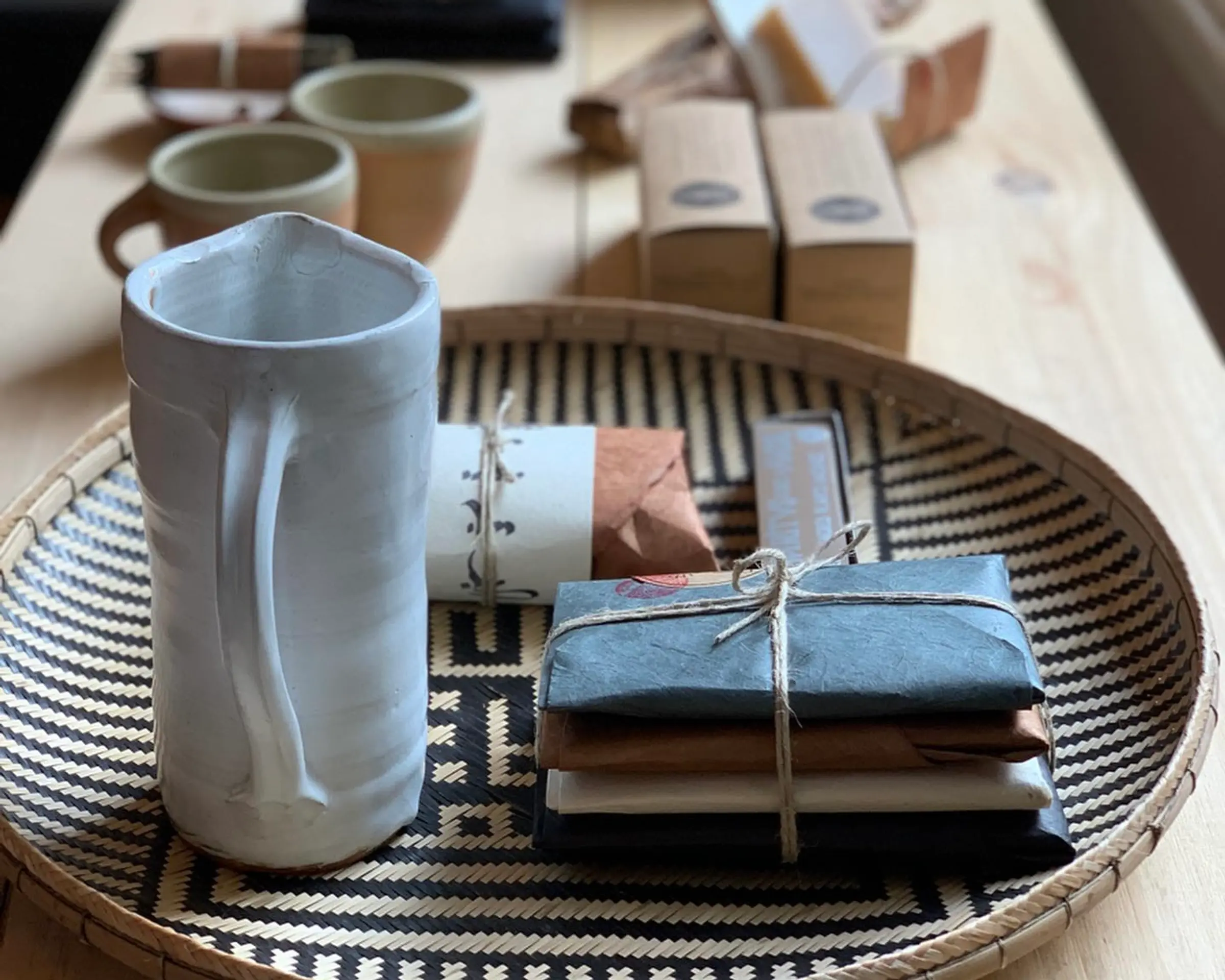 a collection of incense from Incausa on a wooden table