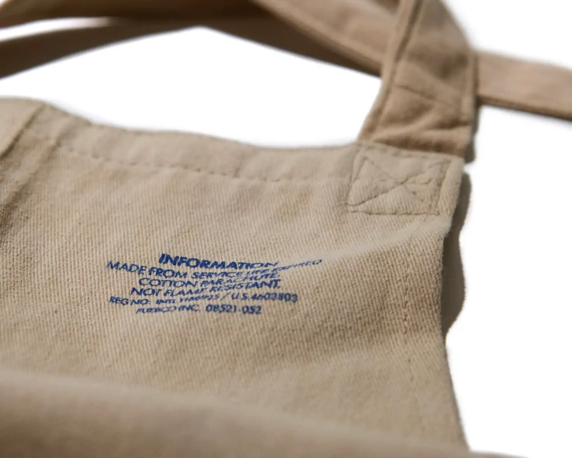 A close up detail of the Puebco cotton potters apron