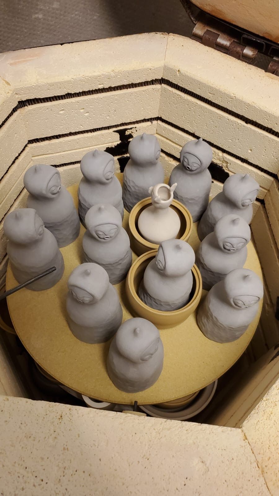a kiln full of CEREs incense burner figurines