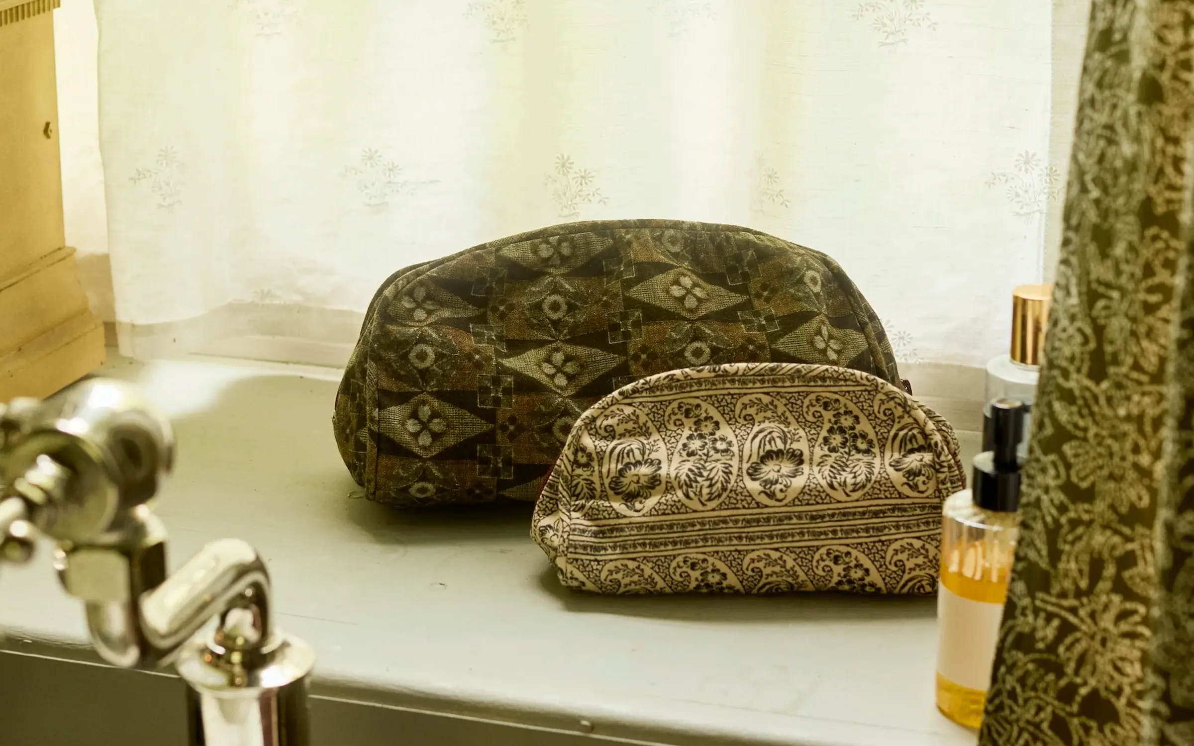 Autumn Sonata Wash Bags in a bathroom setting