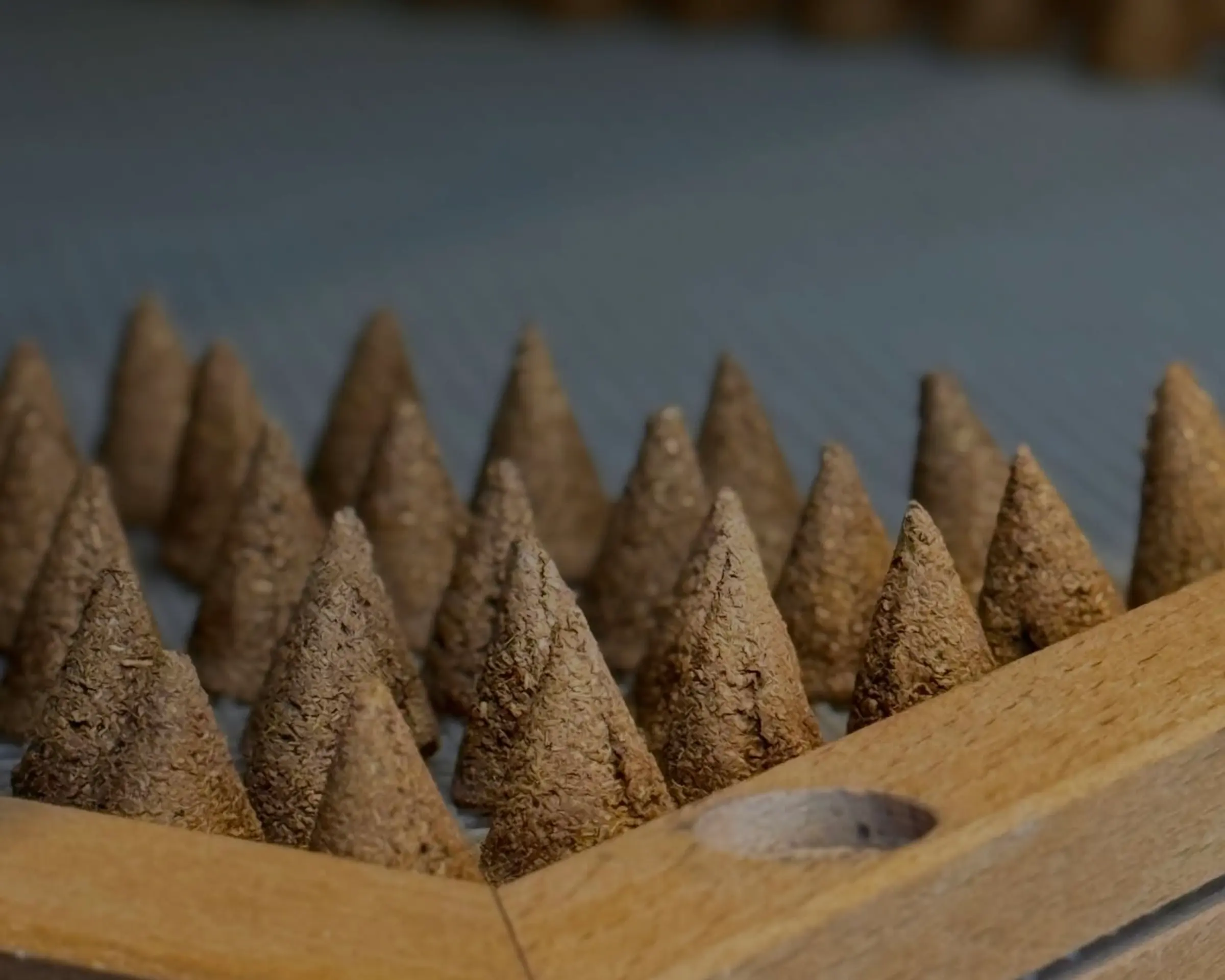 incausa discovery incense cones on a drying rack